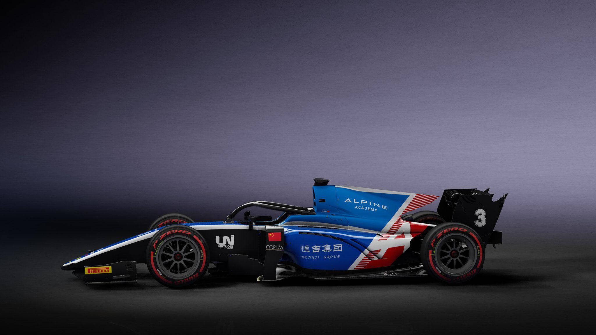F1 桌布 壁紙 — 一架時尚的藍色和紅色Alpine Academy Formula E賽車，號碼3，在黑暗的攝影棚環境中展示。