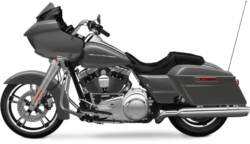 哈雷戴維森 桌布 壁紙 — 一架時尚的銀色Harley-Davidson旅行摩托車，帶有黑色點綴和鍍鉻細節，孤立地立在純黑色背景上。