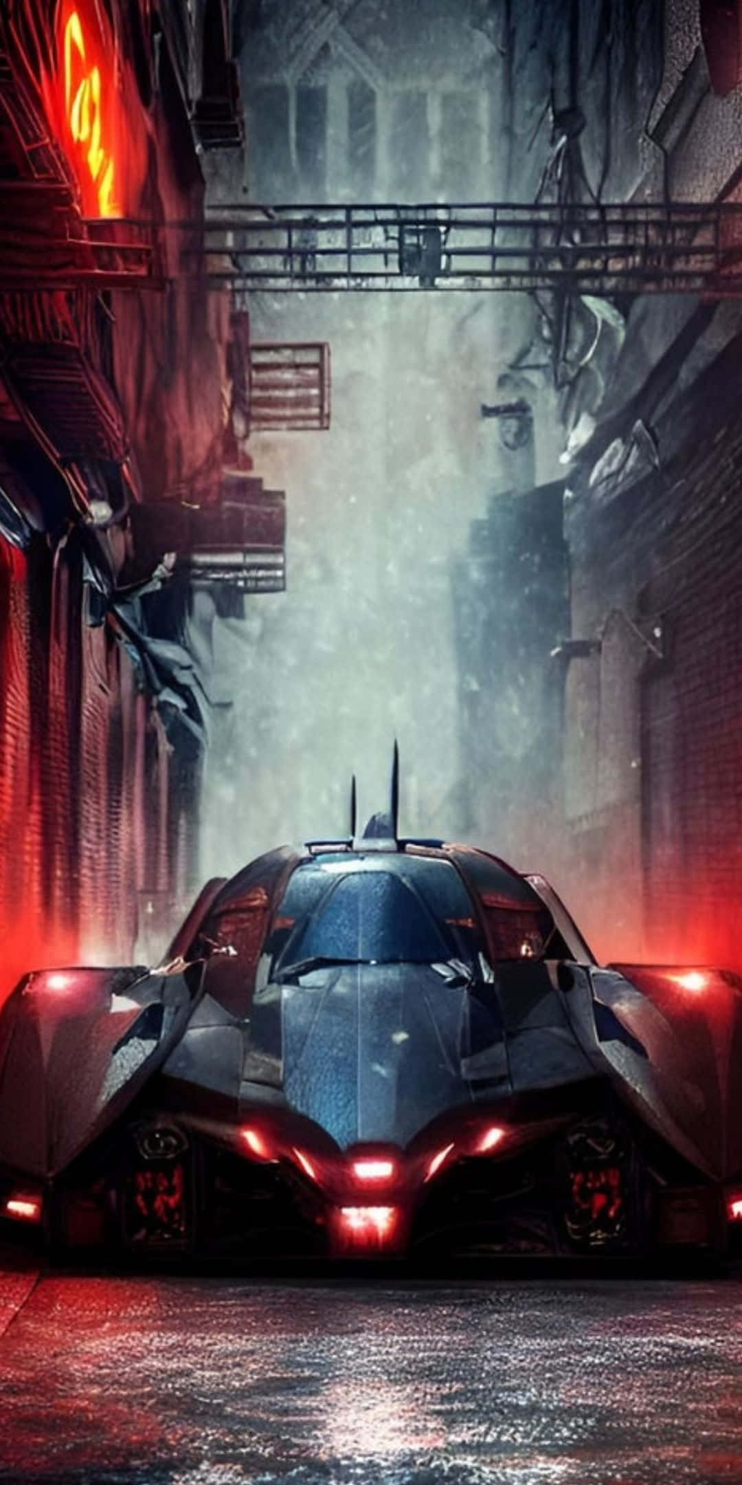 Pixel 3 Batmobile 桌布 壁紙 — 一架時尚的黑色蝙蝠車帶有發光的紅色燈光，在霓虹燈照亮的潮濕高譚小巷中行駛。