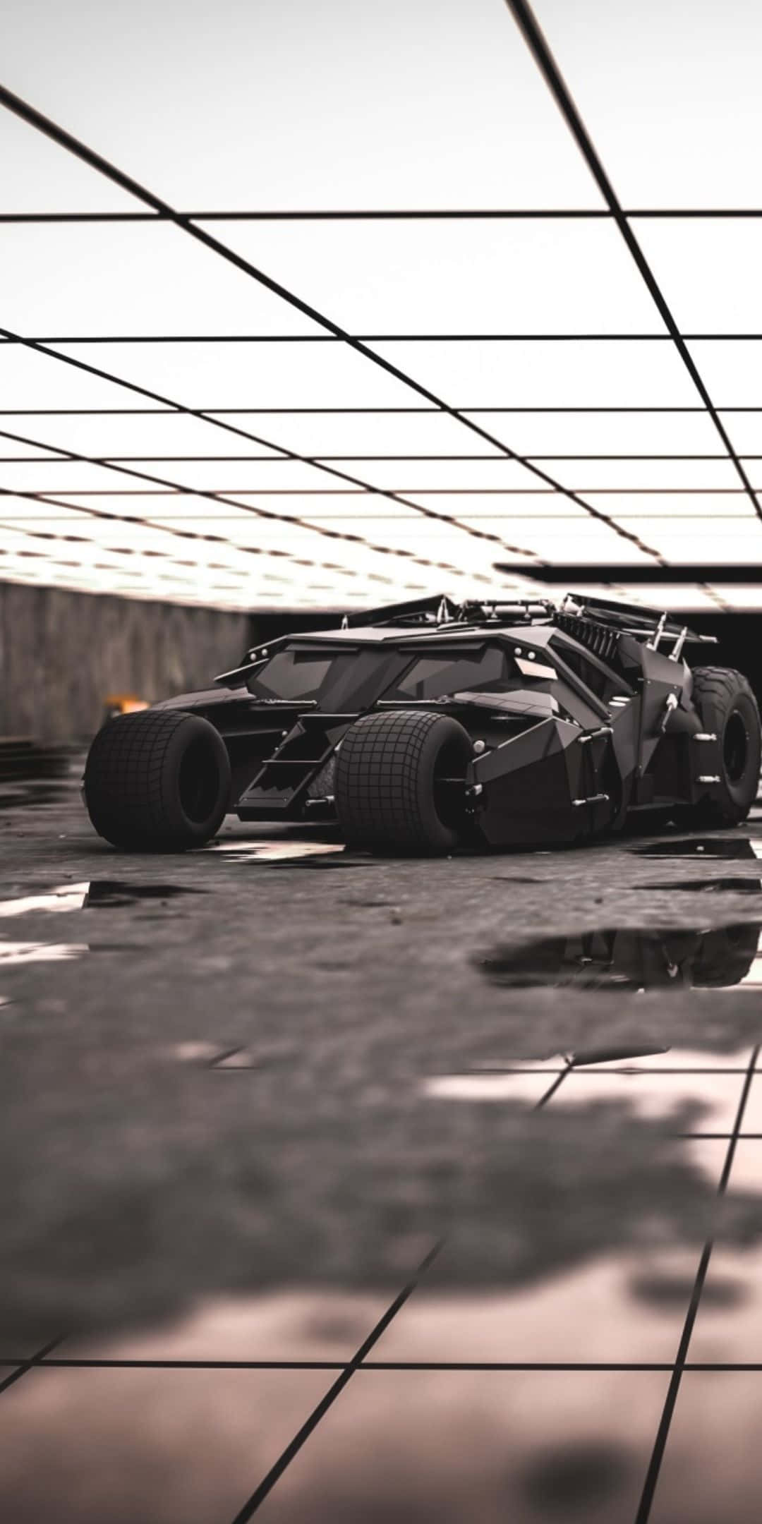 Pixel 3 Batmobile 桌布 壁紙 — 一架時尚的黑色裝甲蝙蝠車停放在昏暗工業車庫的網格圖案天花板下。