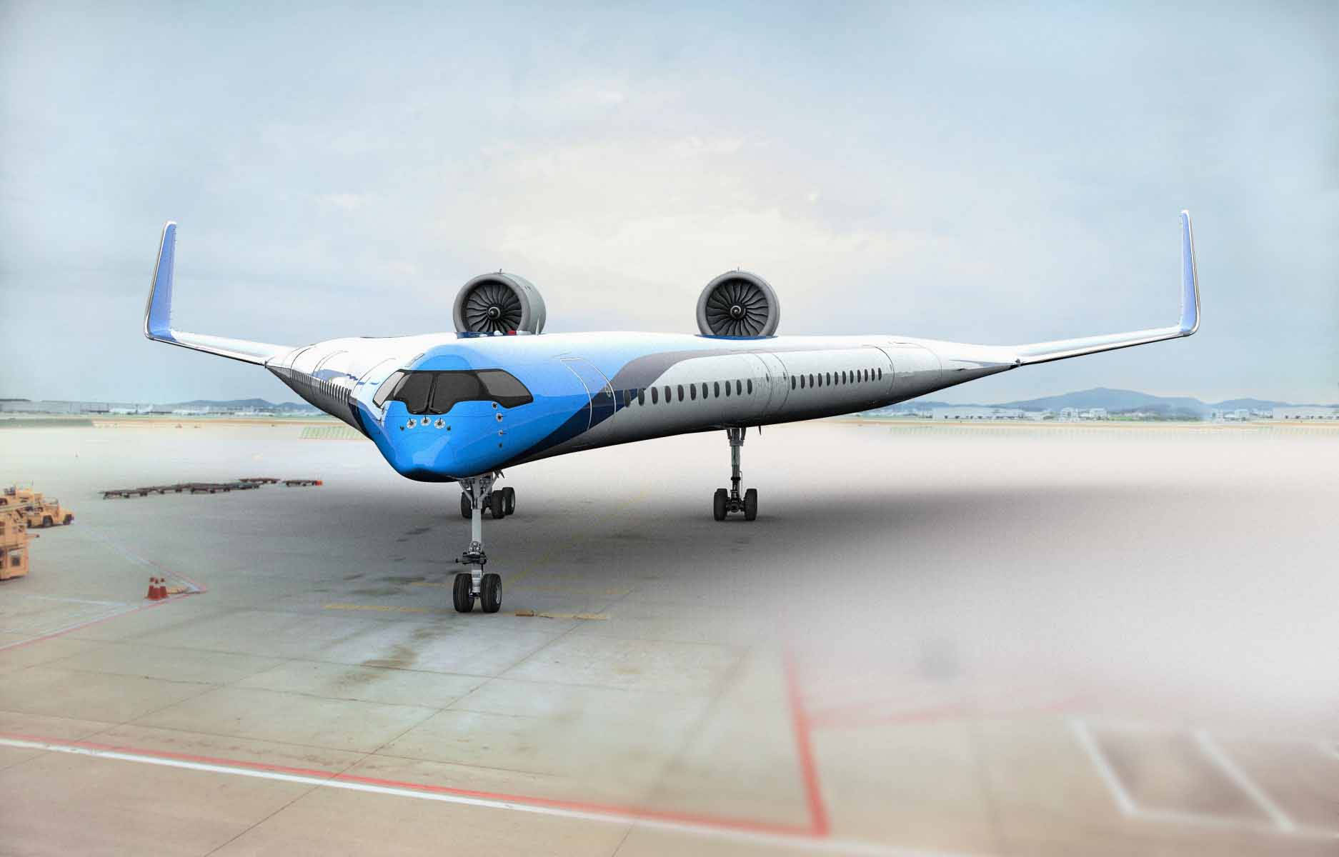Plane 桌布 壁紙 — 一架未來感十足的藍白雙引擎客機停泊在機場停機坪上，天空略帶薄霧。