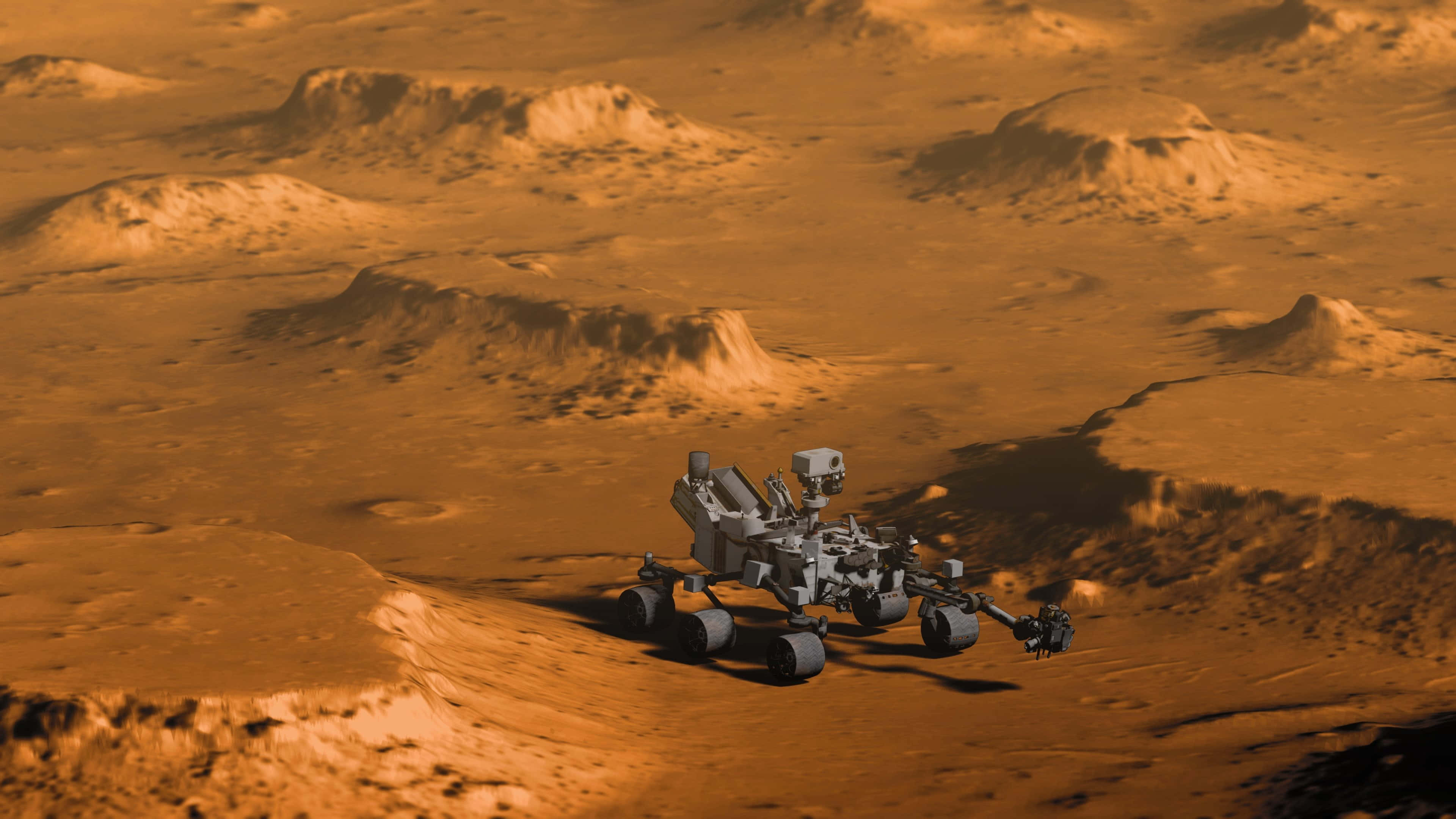 Mars Landscape 桌布 壁紙 — 一架機械探測車在朦朧的橙色天空下探索崎嶇的火星地貌，有起伏的沙丘和岩石露頭。