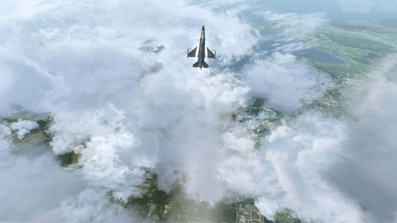 雲朵 桌布 壁紙 — 一架流線型戰鬥機翱翔於蓬鬆白雲之上，展現下方拼布般的景觀。