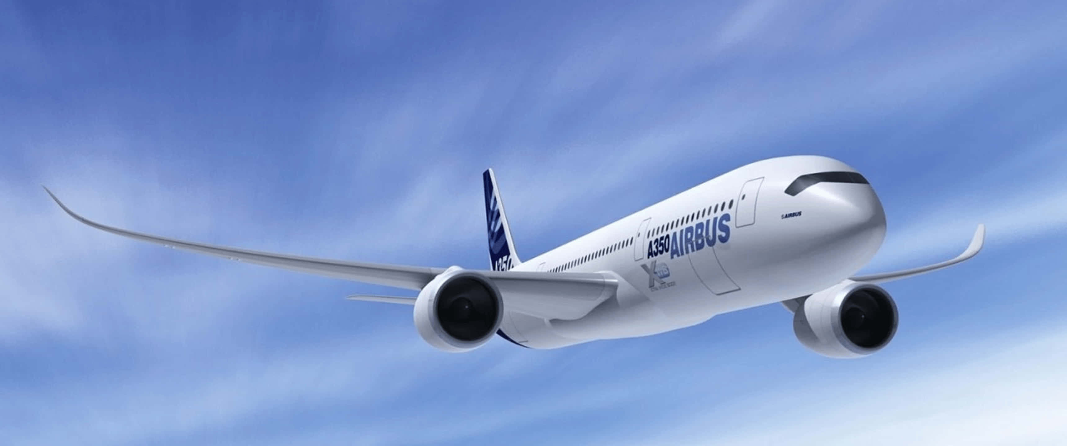 Airbus 桌布 壁紙 — 一架流線型白色空中巴士客機優雅地翱翔於晴朗藍天，點綴著縷縷薄雲。