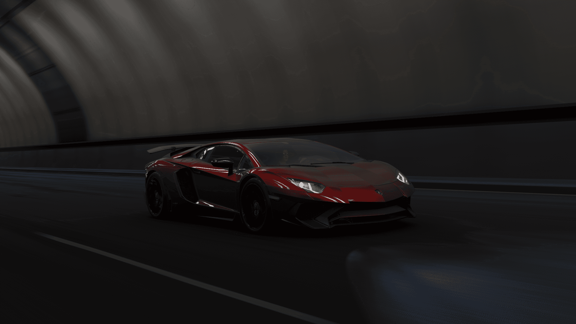 Forza 桌布 壁紙 — 一架流線型紅色藍寶堅尼Aventador在昏暗隧道中疾馳，瀝青路上留下動態模糊效果。