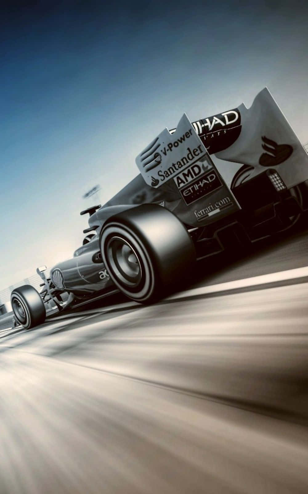 F1 2016 桌布 壁紙 — 一架流線型銀色法拉利F1賽車在晴朗藍天下，於模糊的賽道上貼地飛馳。