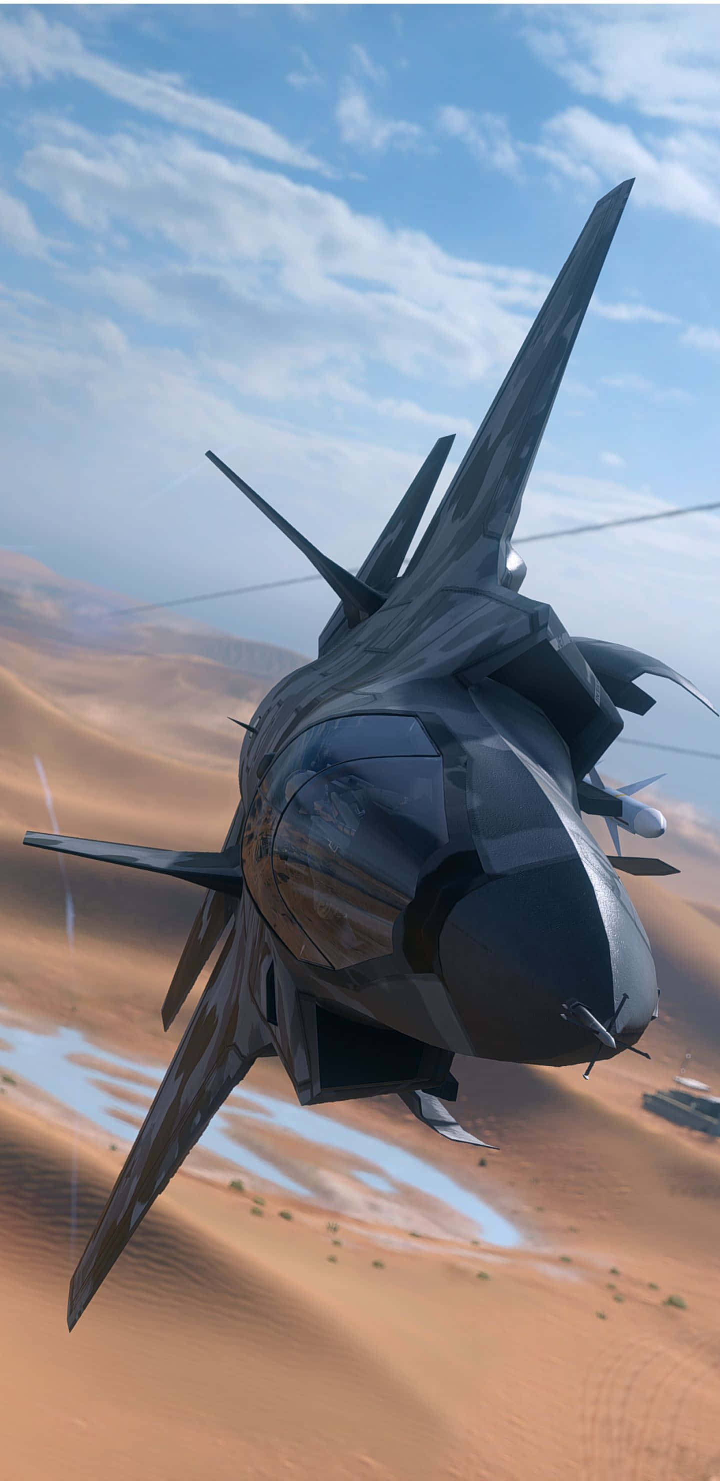 Pixel 3xl Battlefield 4 桌布 壁紙 — 一架流線型黑色戰鬥機在烈日曝曬、河道蜿蜒的沙漠低空飛過，背景是明亮的藍天。