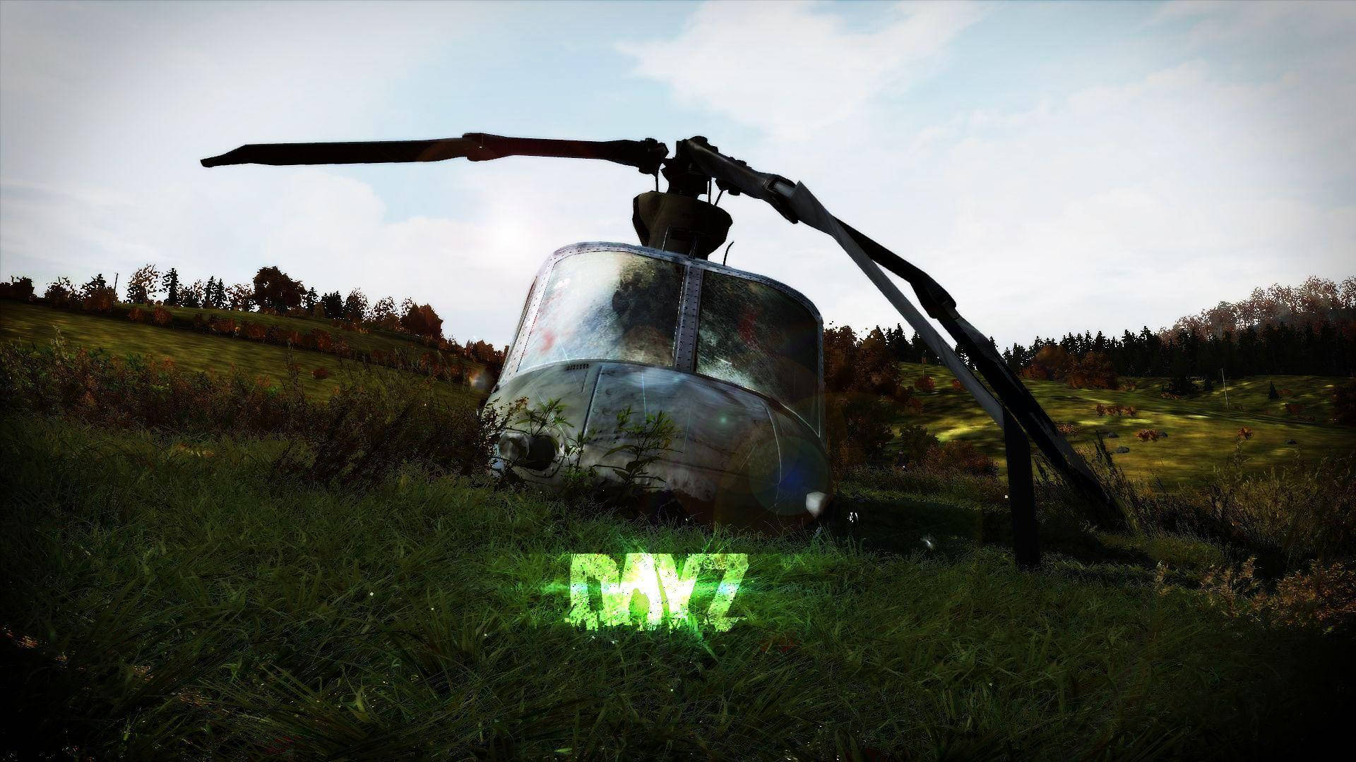 Dayz Desktop 桌布 壁紙 — 一架生鏽的直升機機身被遺棄在草地上，地面有發光的綠色文字。