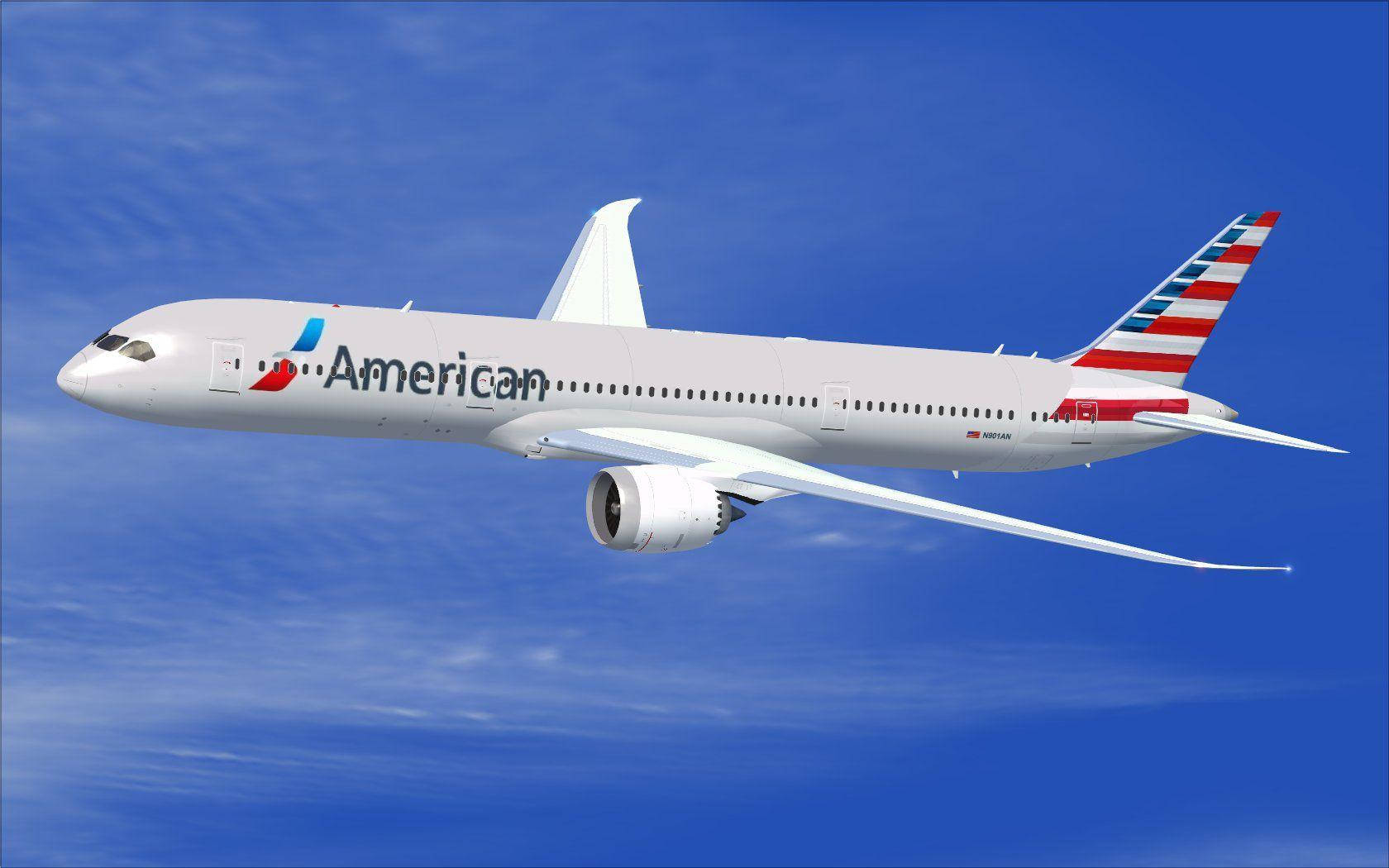 Airlines 桌布 壁紙 — 一架白色的美國航空波音787夢幻客機在晴朗藍天中優雅翱翔，伴隨著縷縷薄雲。