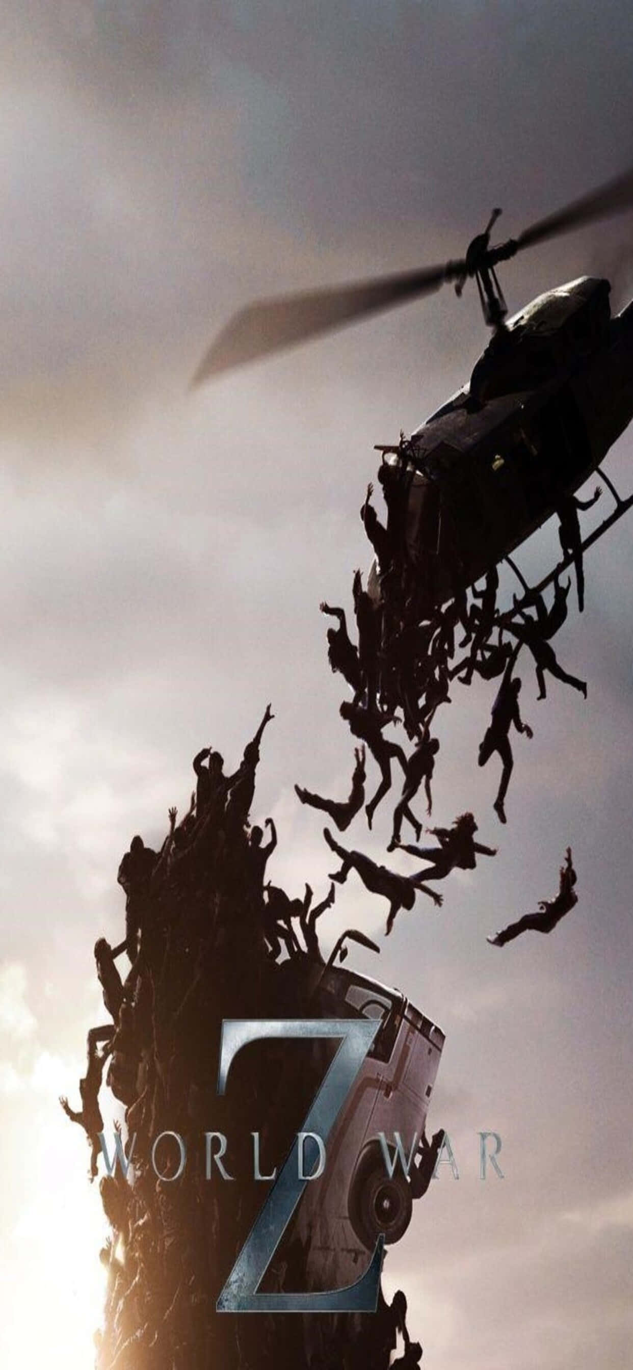 World War Z 桌布 壁紙 — 一架直升機盤旋在一輛被殭屍淹沒的貨車上方，人物從車上跳下，背景是陰雲密布的天空。