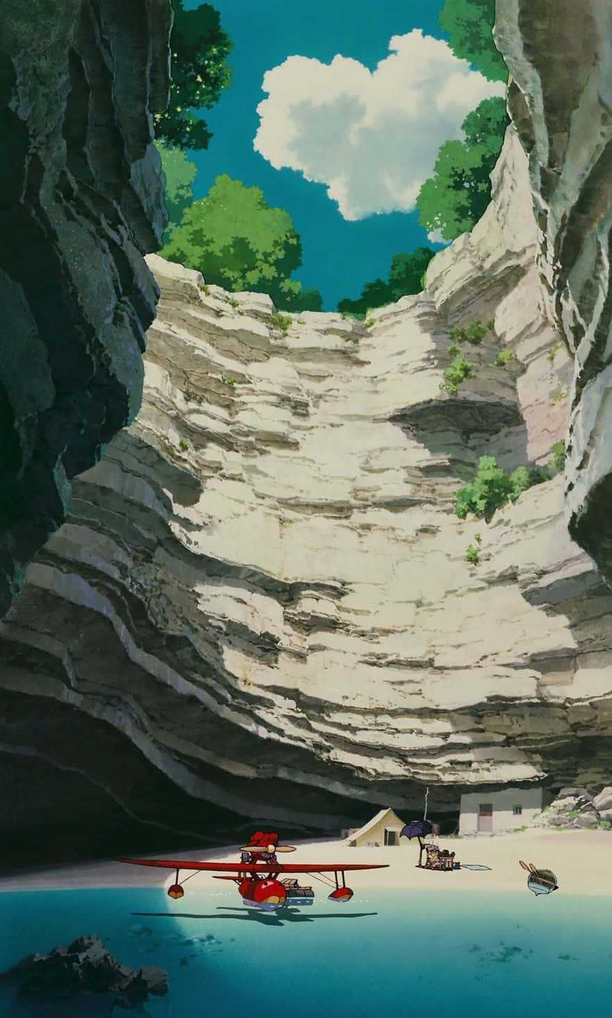Studio Ghibli Phone 桌布 壁紙 — 一架紅色水上飛機停泊在碧綠色的水面上，下方是廣闊的岩石懸崖，長滿茂密的綠樹，上方有一朵心形雲。