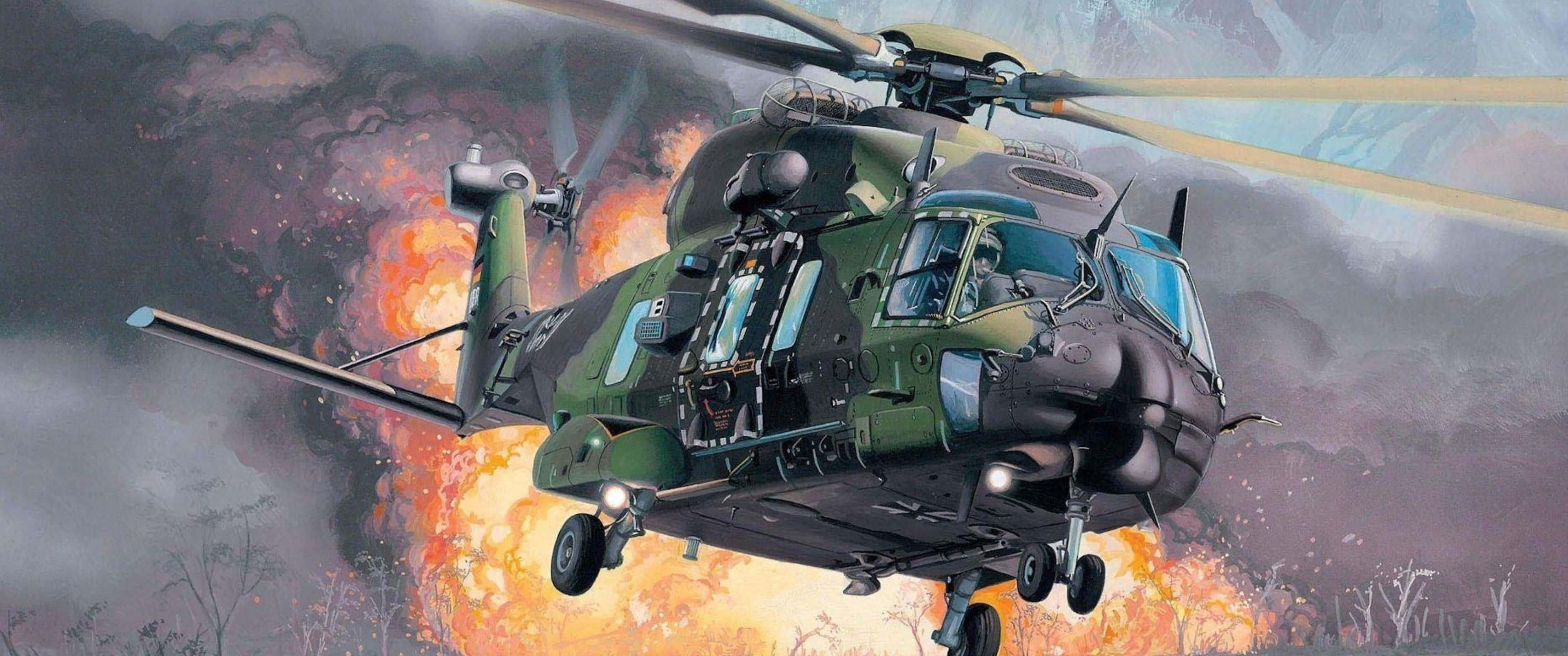 3440x1440p Helicopters 桌布 壁紙 — 一架綠色軍用直升機飛過熾熱的爆炸和煙霧，飛越戰火摧殘的地景。