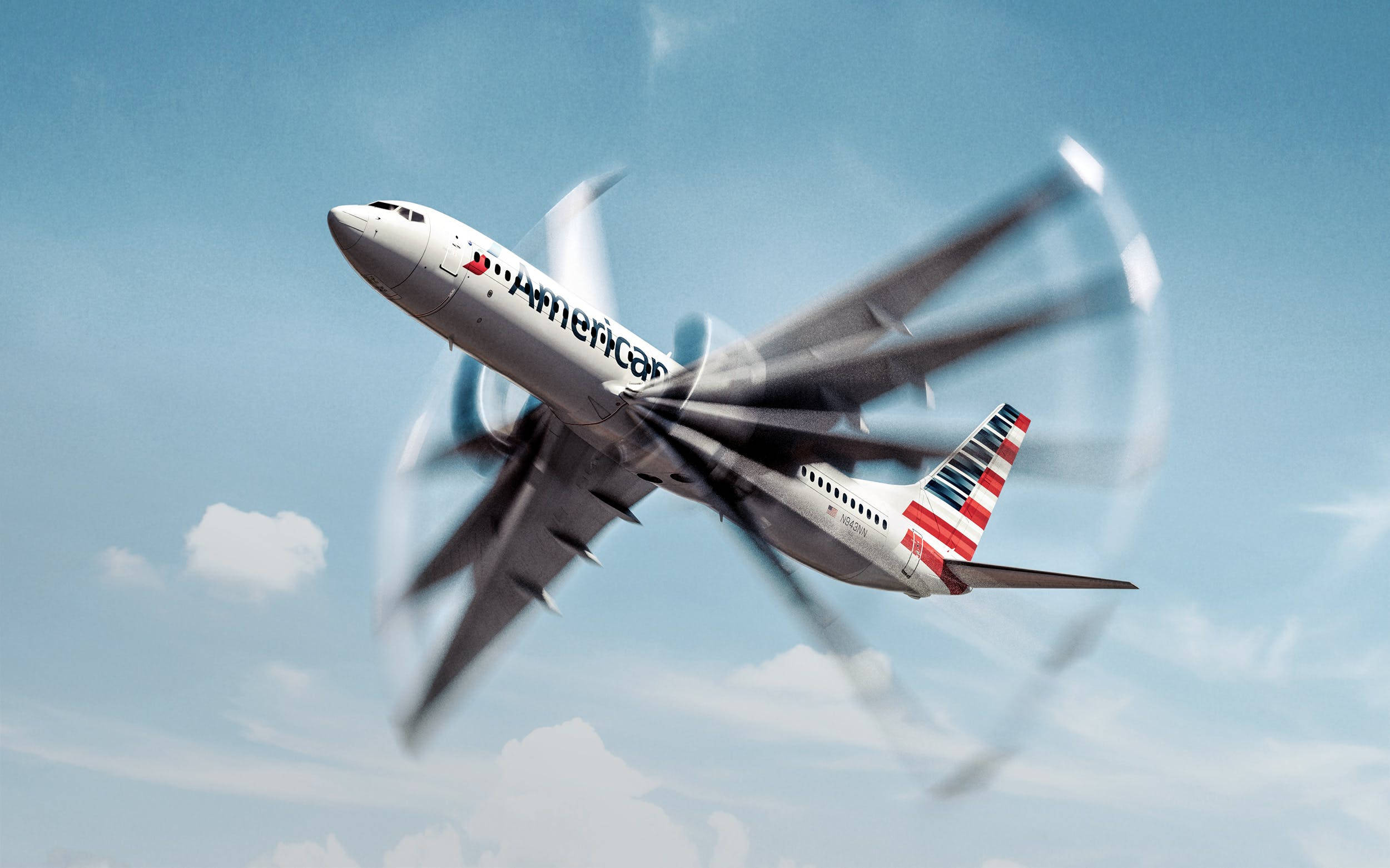 Airlines 桌布 壁紙 — 一架美國航空噴射機在晴朗的藍天中翱翔，機翼因運動模糊而顯得模糊，背景是蓬鬆的白雲。