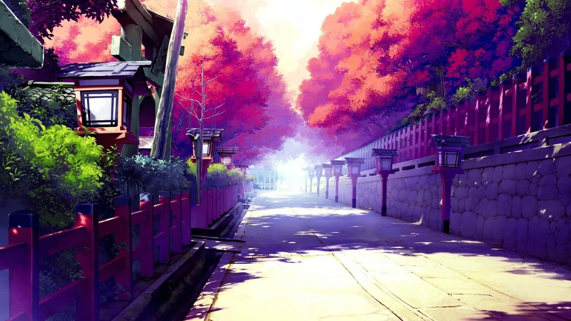 日式粉紅 桌布 壁紙 — 一條充滿活力的動漫風格小徑，兩旁有紅色柵欄和燈籠，穿過一條由火紅樹木組成的隧道，在明亮的陽光下閃耀。