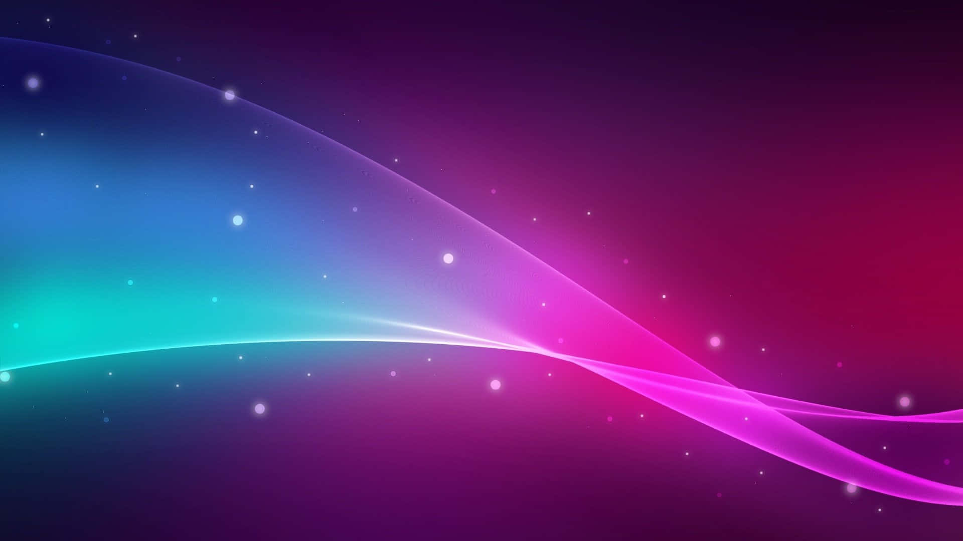 Pink Blue 桌布 壁紙 — 一條充滿活力的漸變波浪在深色背景上對角流動，散發著電光藍、藍綠色和洋紅粉色的光芒，點綴著柔和的白色閃光。