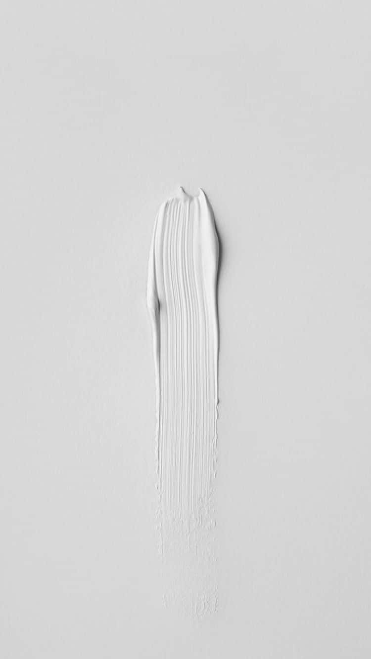 White iPhone 桌布 壁紙 — 一條垂直的厚白色油漆筆觸，拖過一個純淺灰色表面。