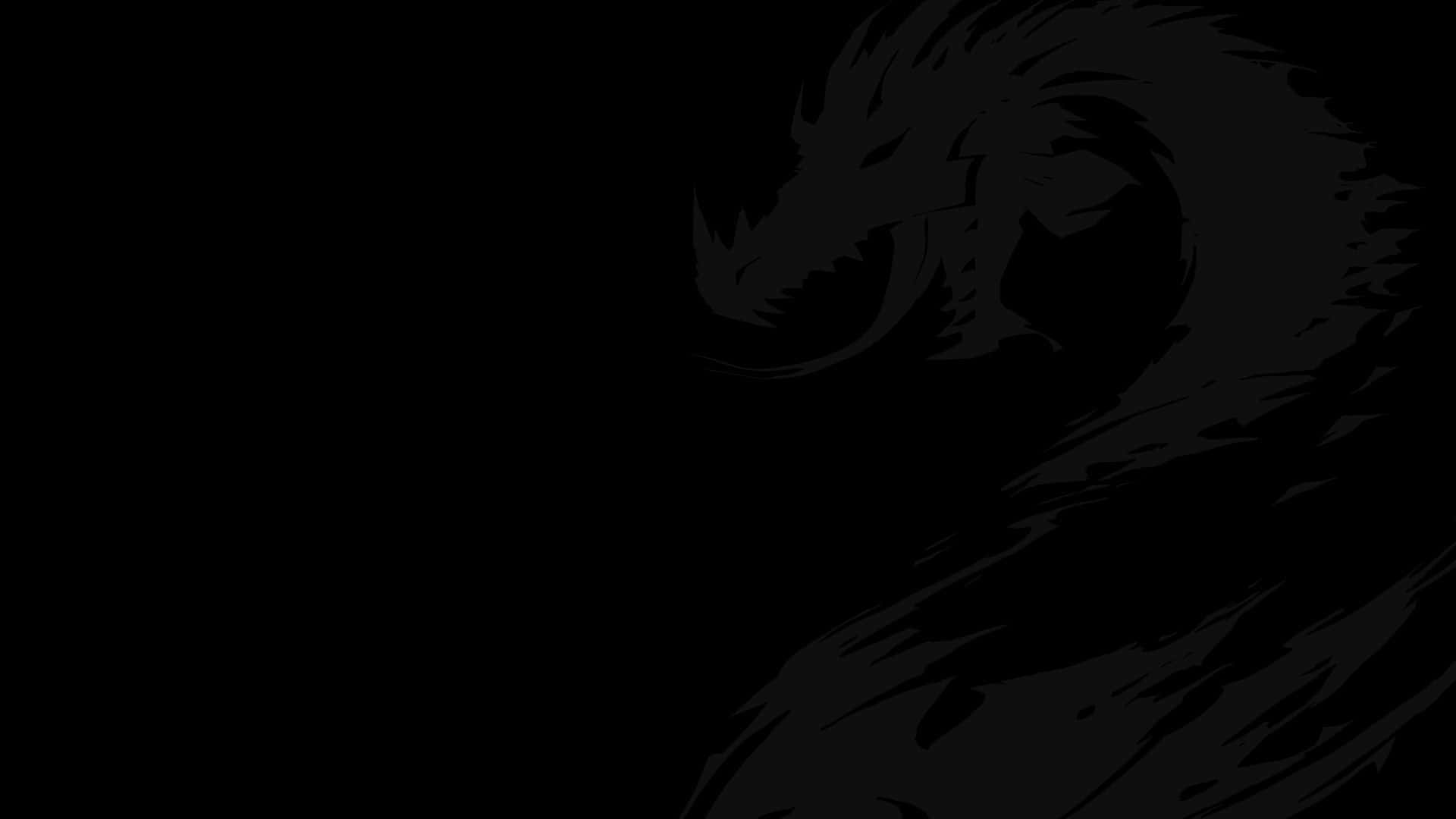 Vantablack 桌布 壁紙 — 一條威嚇的龍剪影在陰暗黑暗中盤繞，露出鋒利的爪子和牙齒。