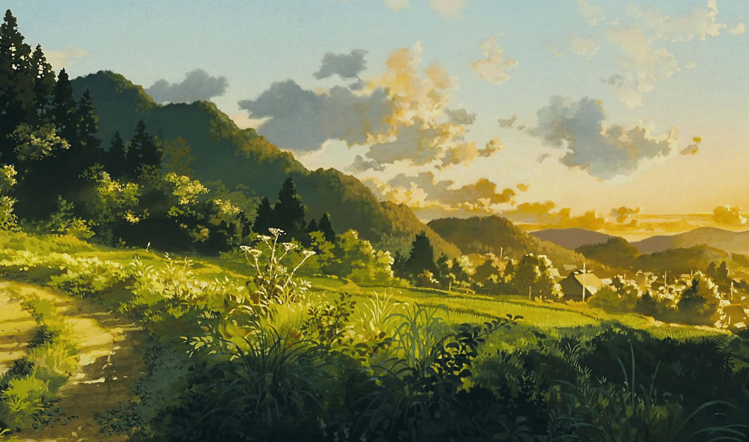 2440x1440 Monitor 桌布 壁紙 — 一條寧靜的鄉間小路蜿蜒穿過鬱鬱蔥蔥的綠色山丘，天空金黃的日落和散落的雲彩。