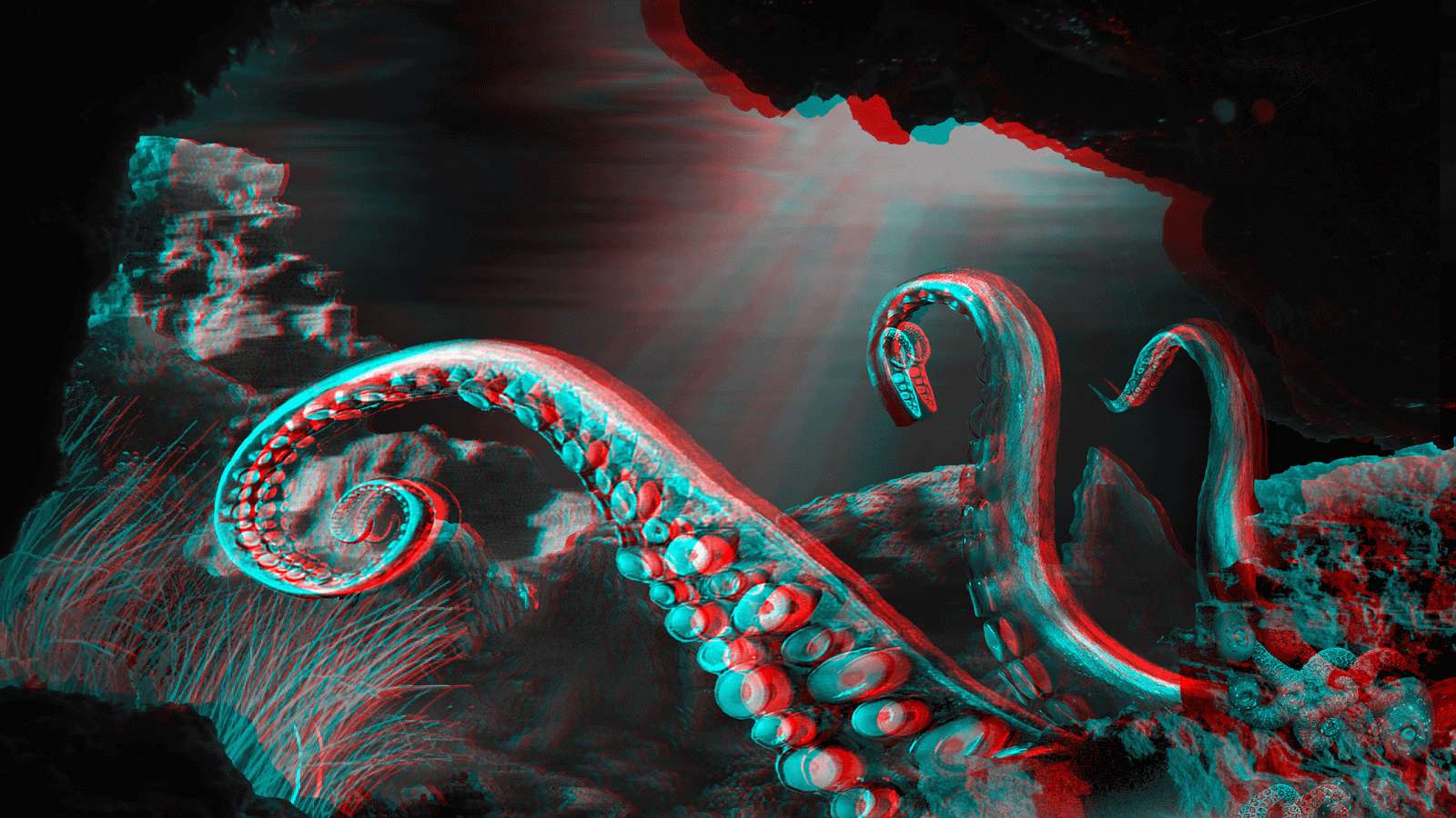 Giant Squid 桌布 壁紙 — 一條巨大的章魚觸手，帶有發光的紅色和青色吸盤，從被光束照亮的黑暗水下洞穴中出現。