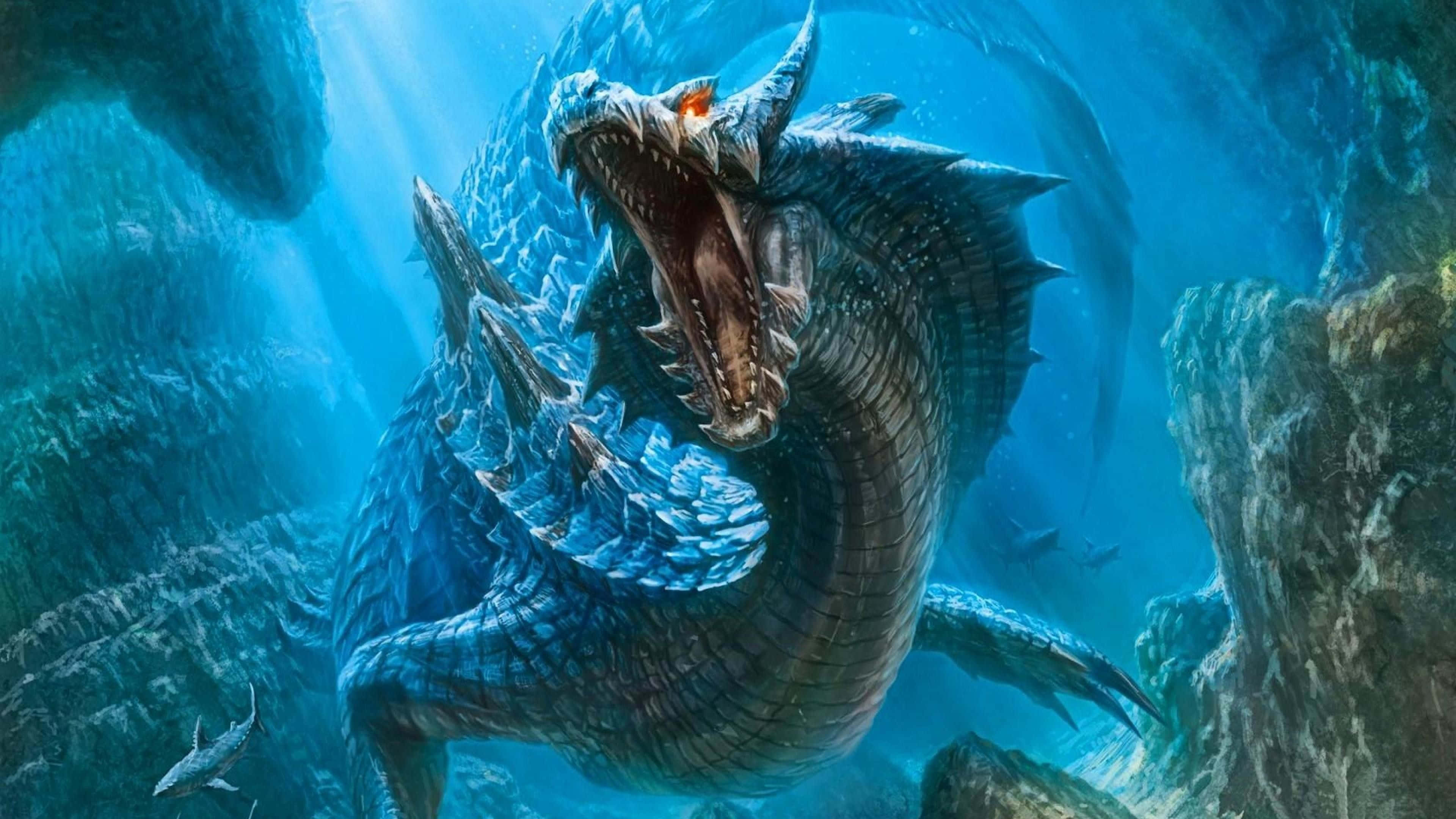 Beautiful Dragon 桌布 壁紙 — 一條巨大的藍鱗海龍，閃爍著橙色光芒的眼睛，在鋸齒狀岩石間的水下發出威脅性的咆哮。