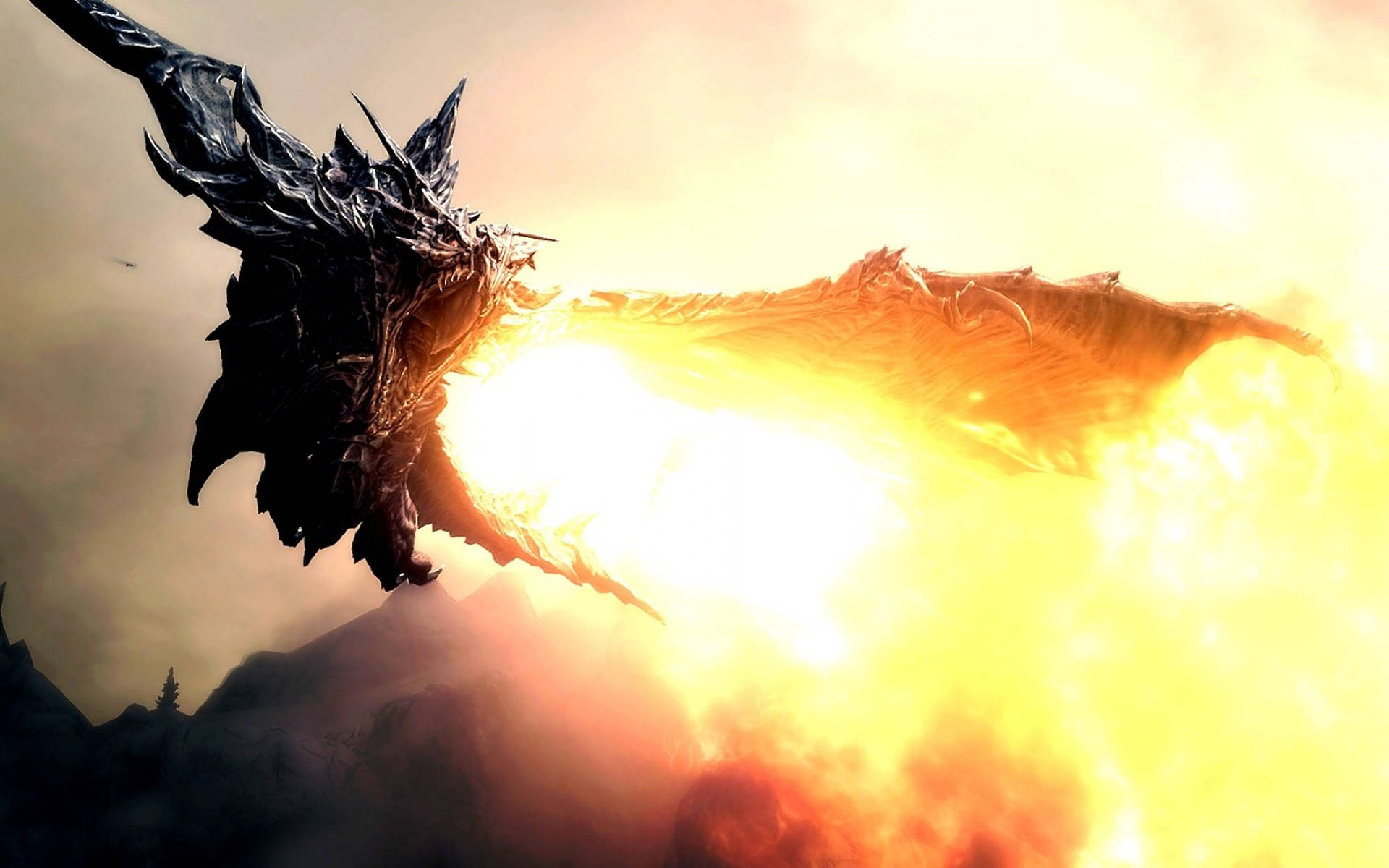 The Elder Scrolls V Skyrim 桌布 壁紙 — 一條巨大的黑暗巨龍在日落時分對著山區景觀噴出刺眼的火焰。