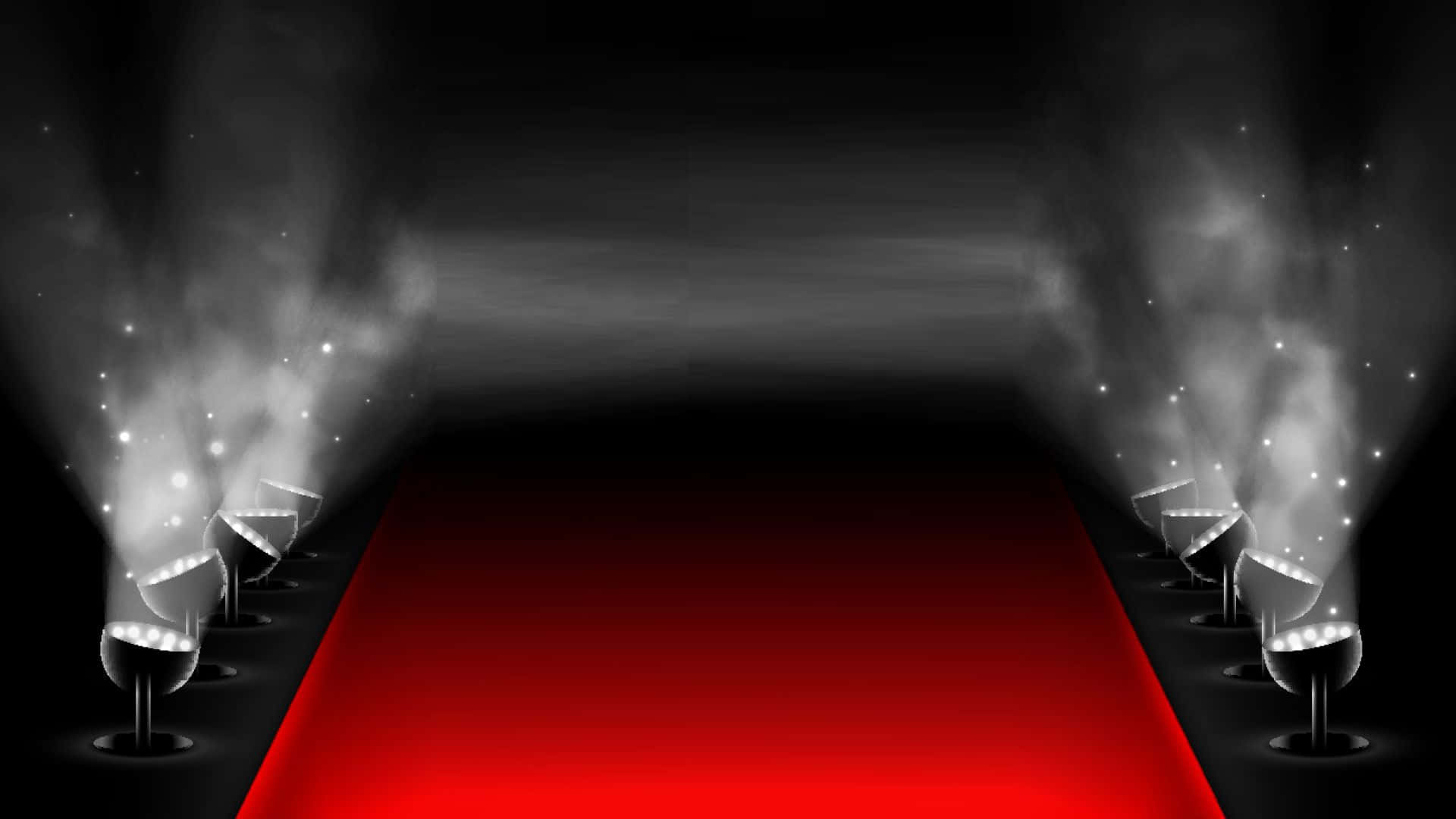 Red Carpet 桌布 壁紙 — 一條戲劇性的紅地毯在黑色天花板下，兩旁有聚光燈和旋轉煙霧，延伸進黑暗之中。