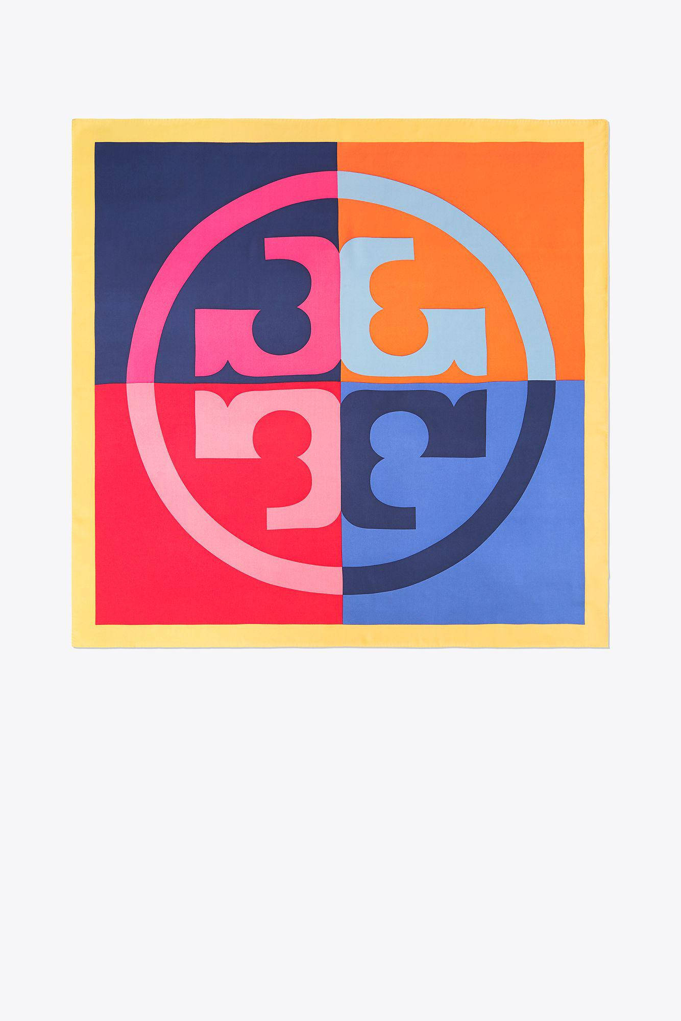 Tory Burch 桌布 壁紙 — 一條方形圍巾，帶有醒目幾何標誌，分為四個彩色象限，並以黃色邊框框起。