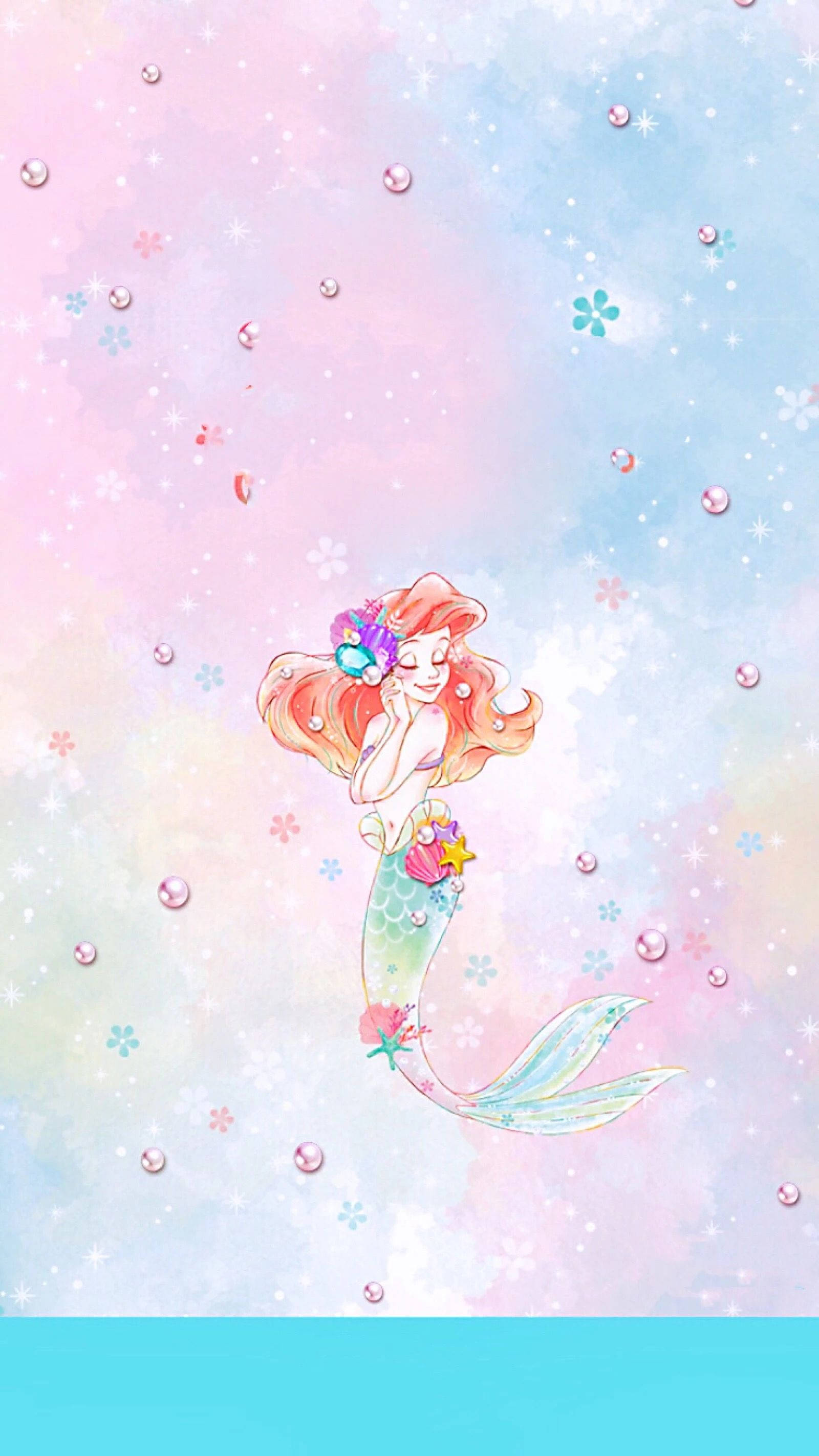 The Little Mermaid 桌布 壁紙 — 一條異想天開的水彩美人魚，擁有飄逸的紅髮和鑲有寶石的尾巴，在夢幻般的天空中漂浮在粉彩泡泡和漂浮的花朵之間。