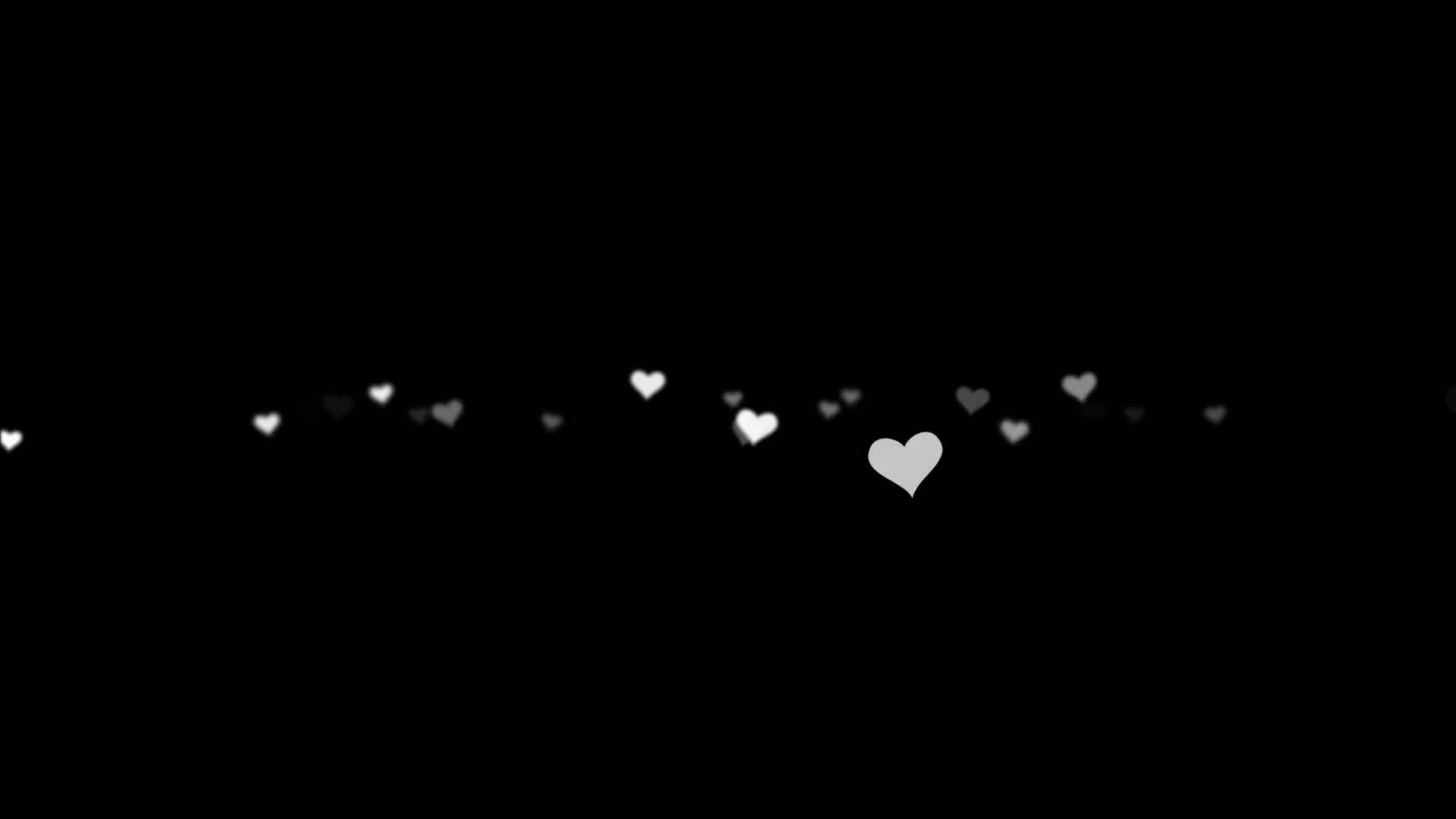 Dark Heart 桌布 壁紙 — 一條發光白色心形的軌跡在極簡數位動畫中飄過深邃的黑色虛空。