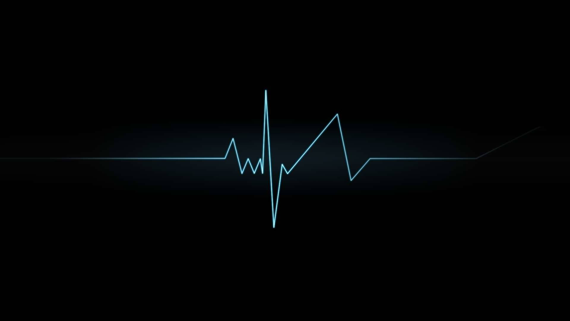 Heartbeat 桌布 壁紙 — 一條發光的藍色心電圖線條在帶有微妙漸變照明的深黑色背景上脈動。