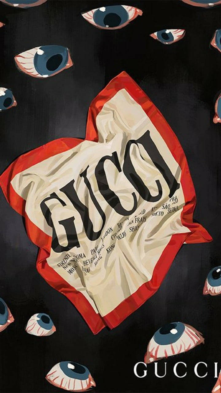 Gucci iPhone 桌布 壁紙 — 一條皺巴巴的 Gucci 圍巾，帶有粗體黑色標誌，在黑暗背景中漂浮的眼球間飄浮。