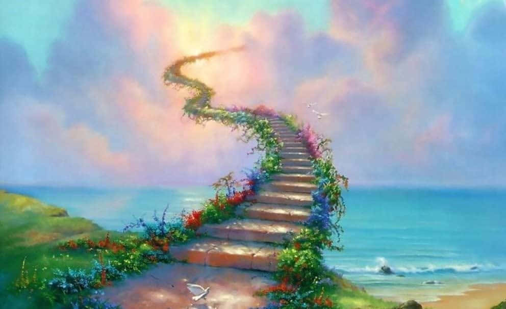 Beautiful Heaven 桌布 壁紙 — 一條蜿蜒的石階梯，點綴著色彩繽紛的花朵，從海岸懸崖向上延伸至燦爛的天空。