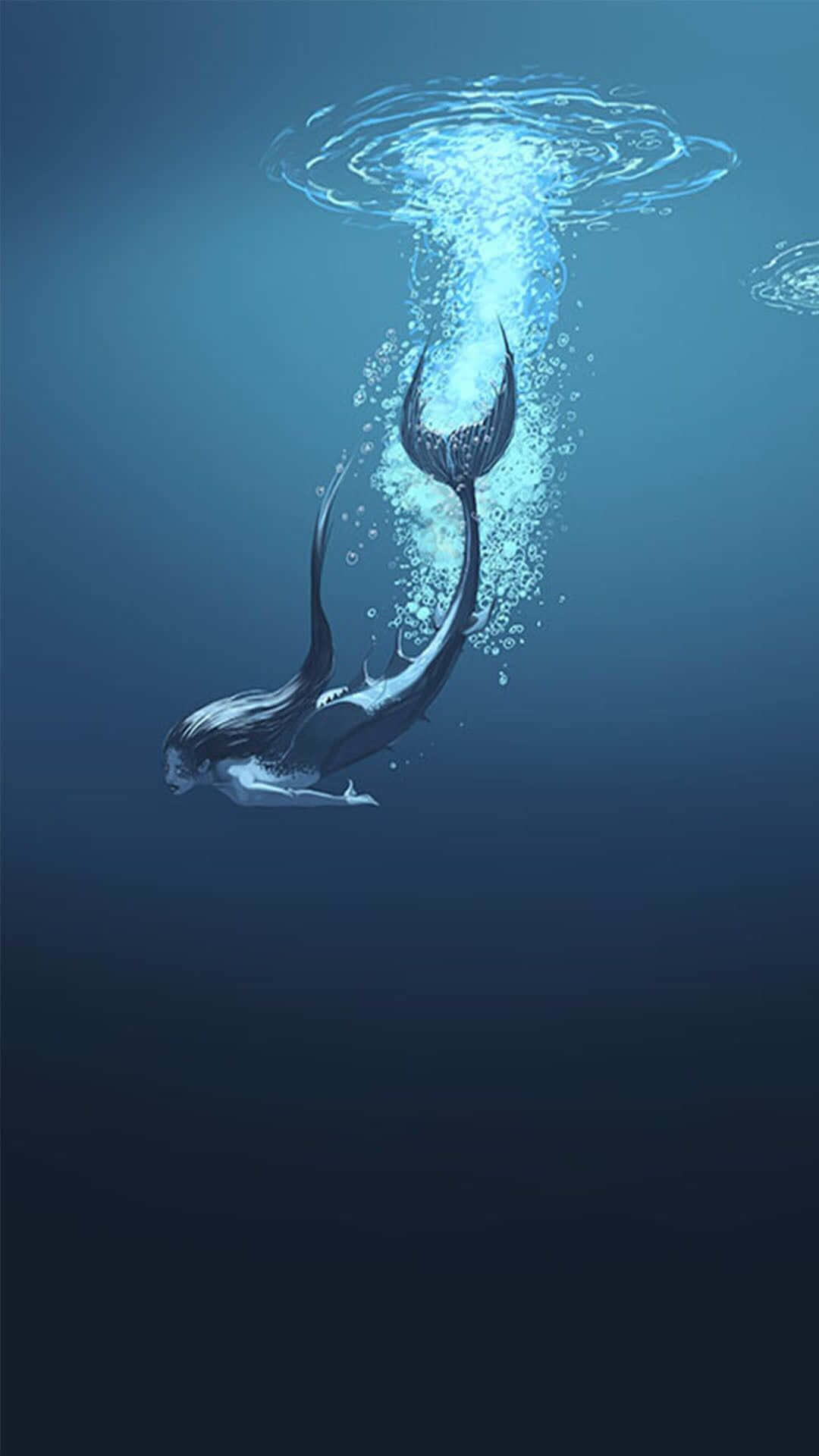 美人魚 桌布 壁紙 — 一條長黑髮的美人魚在深藍色海水中向上游，在水面留下一串氣泡和漣漪。