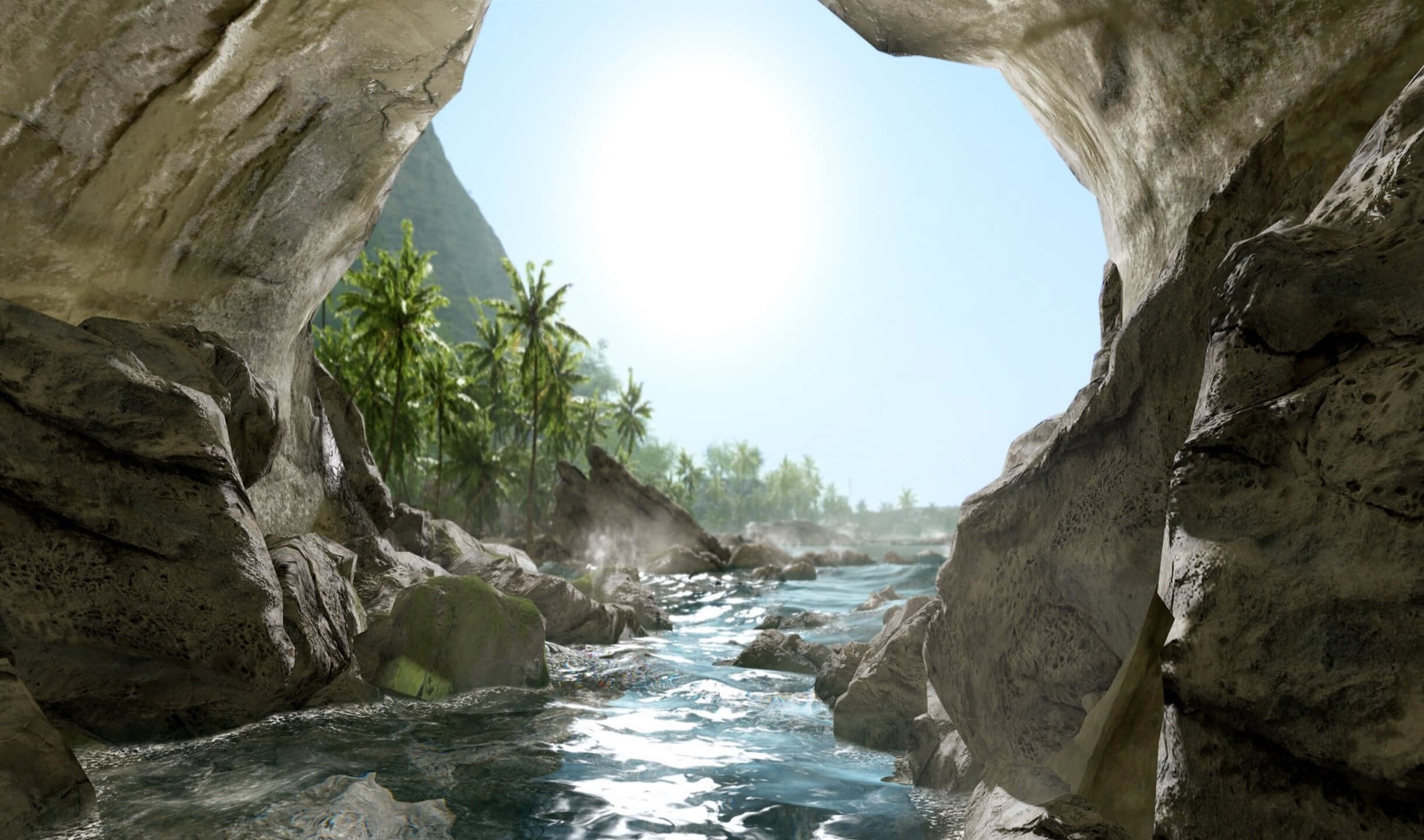 2440x1440 Crysis 3 桌布 壁紙 — 一條陽光普照的河流流經岩石洞穴開口，展現出茂密的熱帶叢林和遠山。
