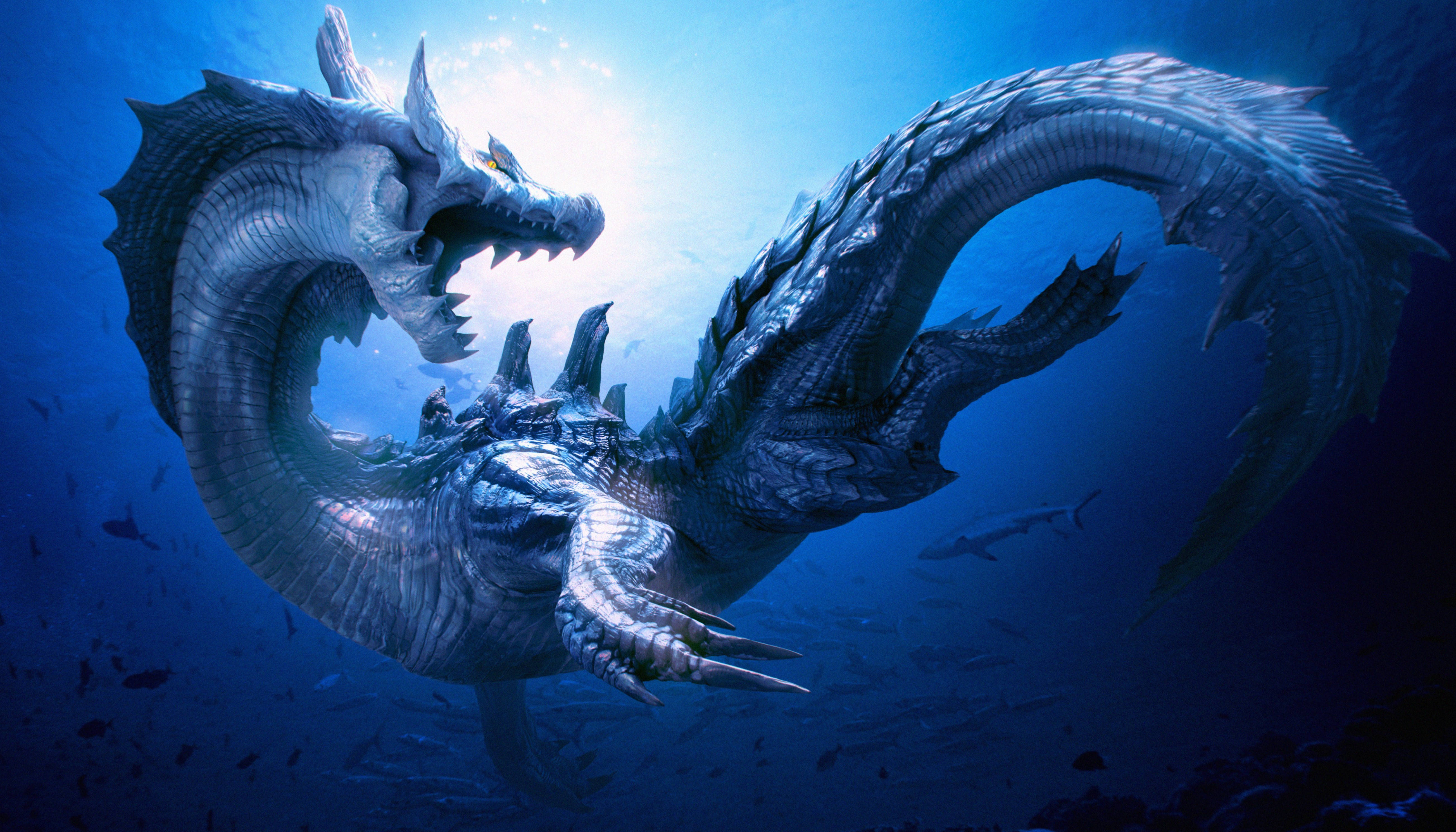 Monster Hunter 桌布 壁紙 — 一條雄偉的銀龍在深藍色的海洋水域中滑行，陽光從上方過濾而下。