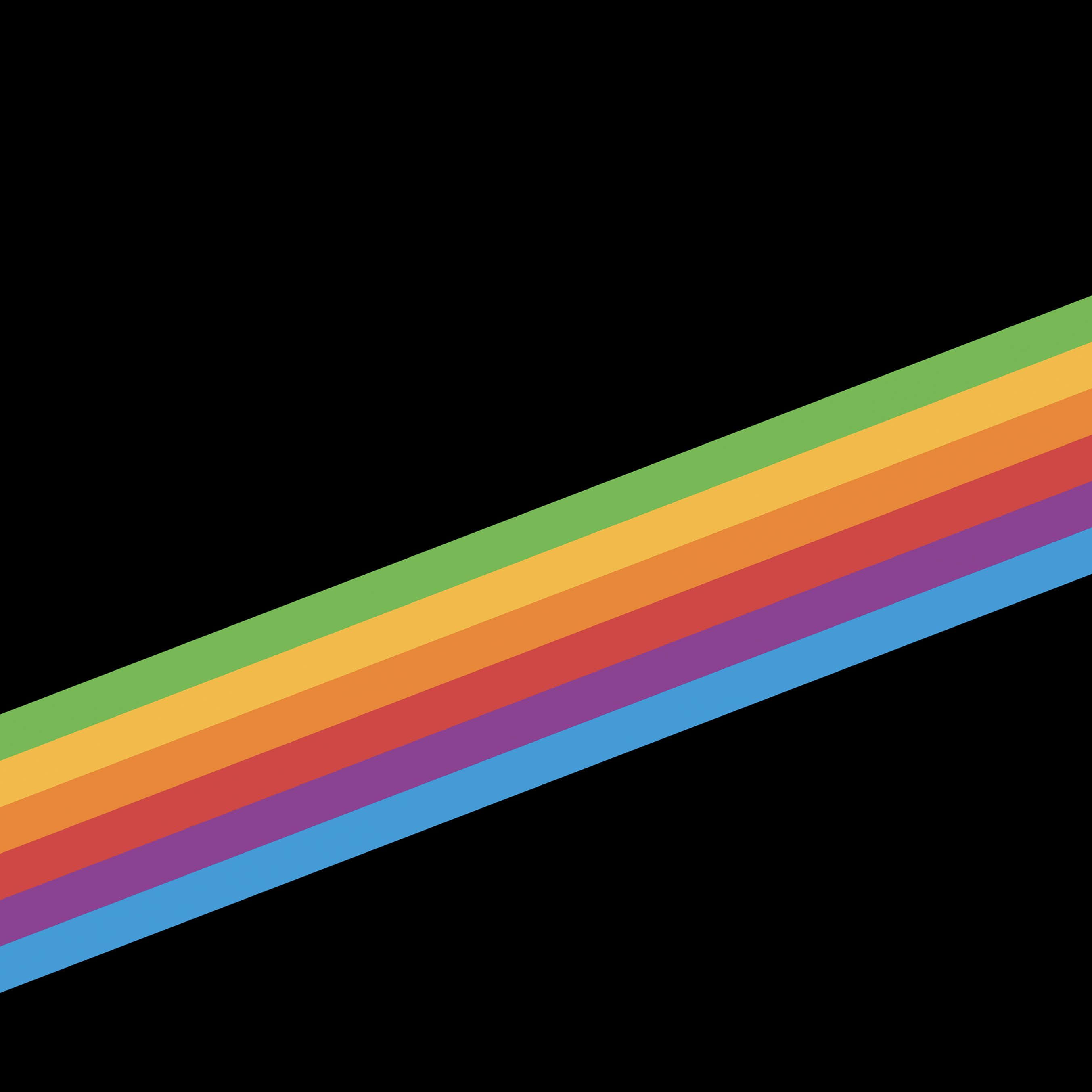 Rainbow Colours 桌布 壁紙 — 一條鮮豔色彩的對角彩虹條紋劃過純黑背景。
