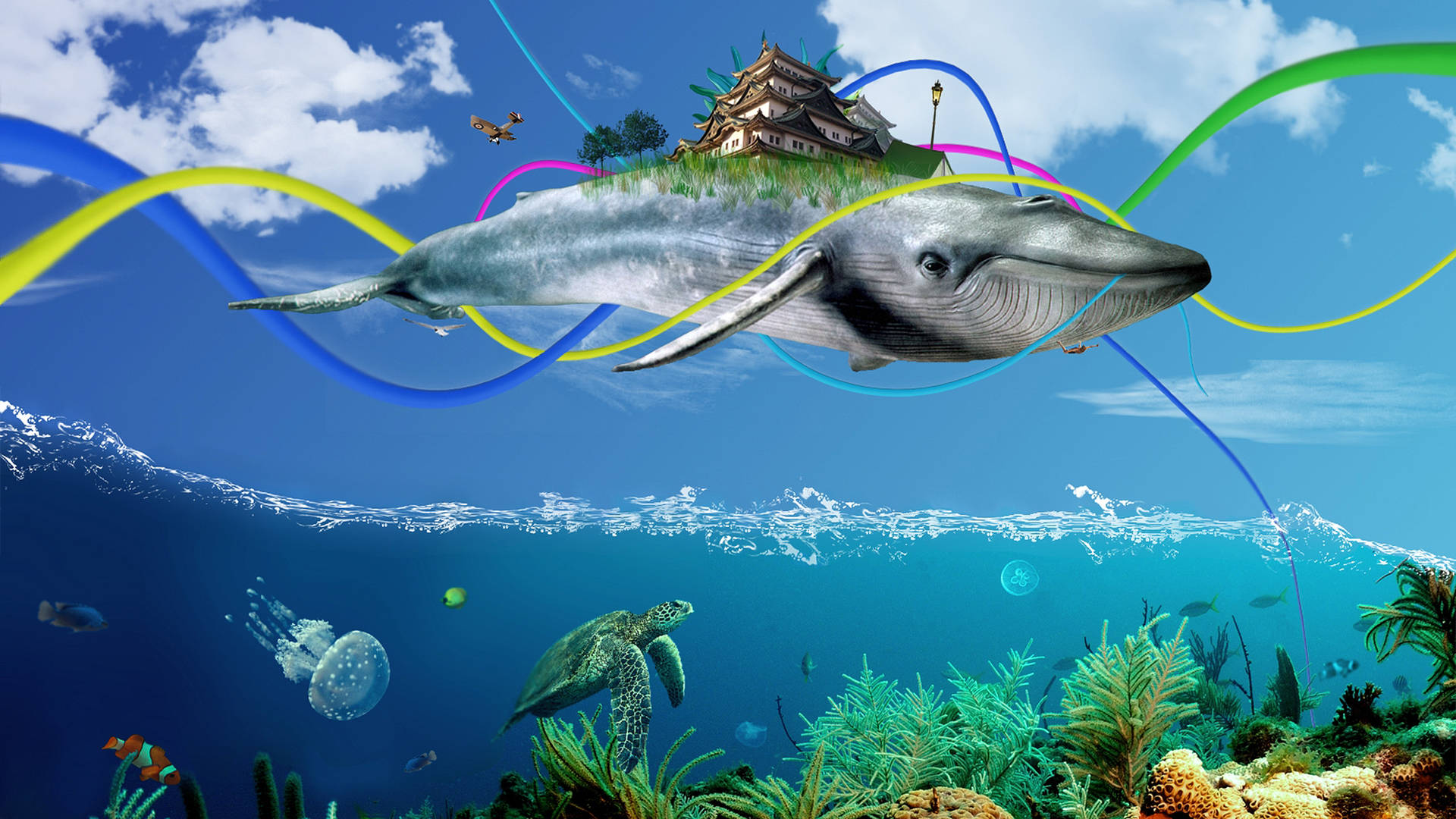 鯨魚 桌布 壁紙 — 一條鯨魚背負著一座漂浮的日本城堡，在充滿活力的珊瑚礁上方，水母和海龜在下方游動。