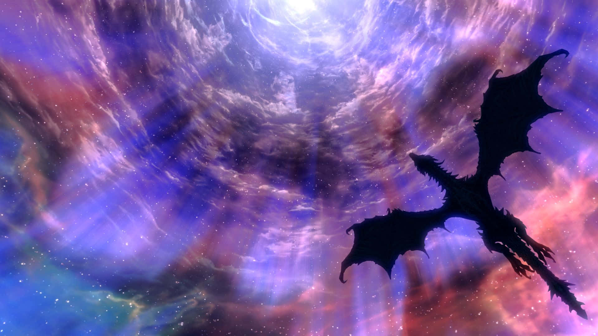Skyrim Alduin 桌布 壁紙 — 一條黑暗的龍剪影在充滿活力的宇宙星雲中翱翔，散發著紫色、粉紅色和藍色的光芒。