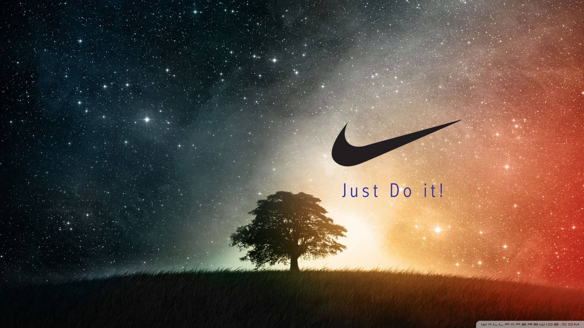 Just Do It 桌布 壁紙 — 一棵孤樹在星空下草坡上的剪影，伴隨著發光的日落和Nike標誌及標語。
