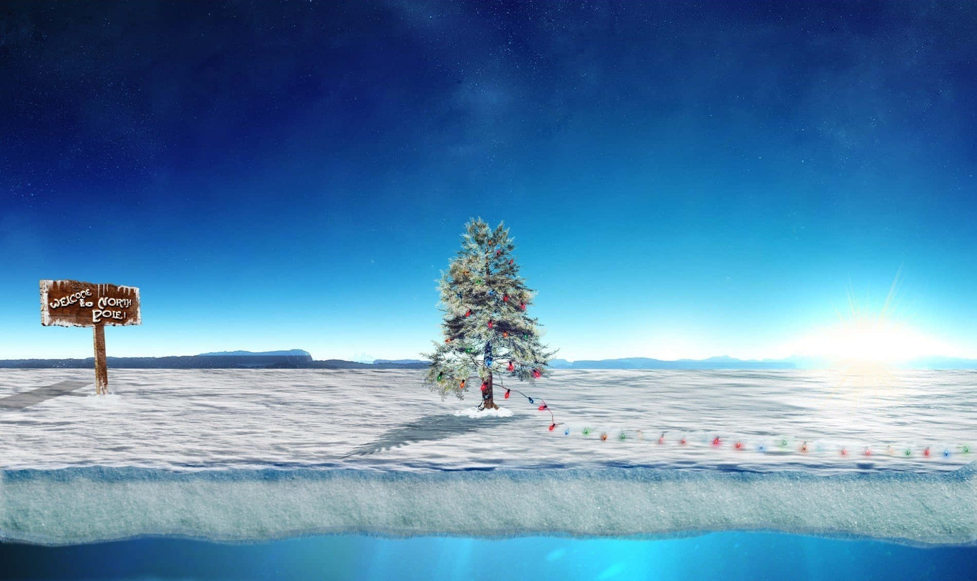 North Pole 桌布 壁紙 — 一棵孤獨的雪覆蓋的聖誕樹，掛滿彩色燈飾，矗立在冰凍的荒原上，星空暮色下。