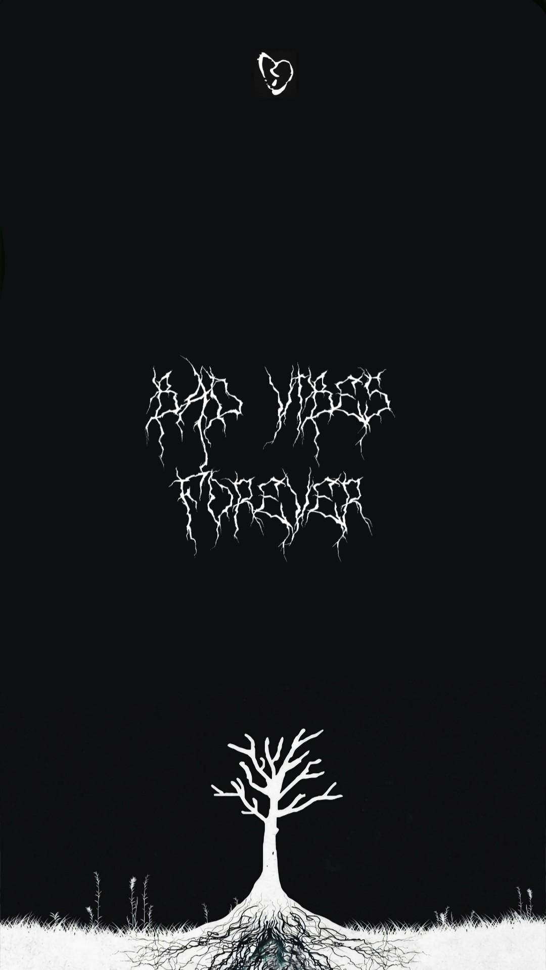 xxxtentacion 美學 桌布 壁紙 — 一棵裸露根部的白色樹木矗立在雪原上，下方是鋸齒狀文字和一顆破碎的心，背景是黑色虛空。