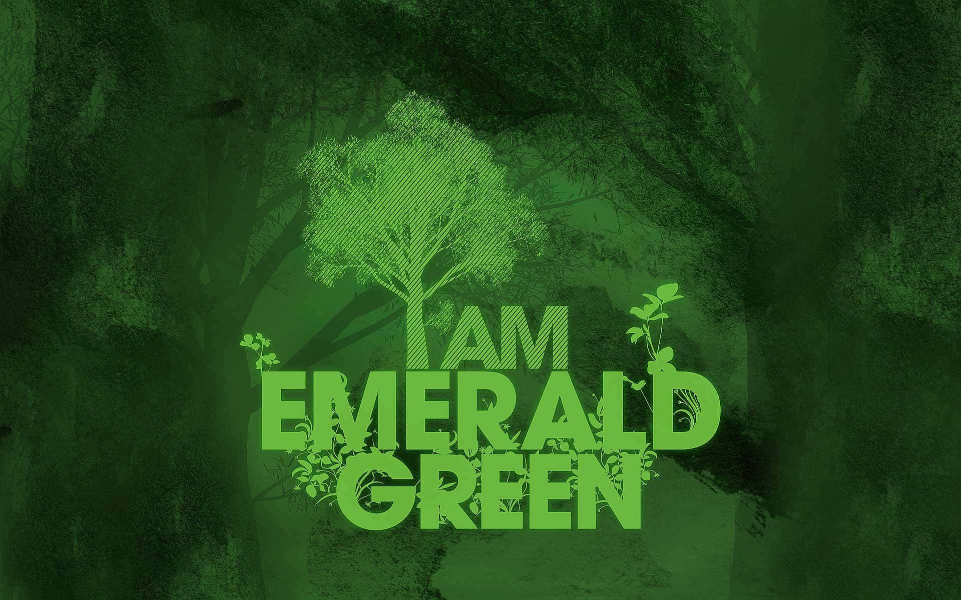 Emerald 桌布 壁紙 — 一棵風格化的樹，帶有文字「I AM EMERALD GREEN」，從深綠色森林背景中浮現，帶有紋理葉片。