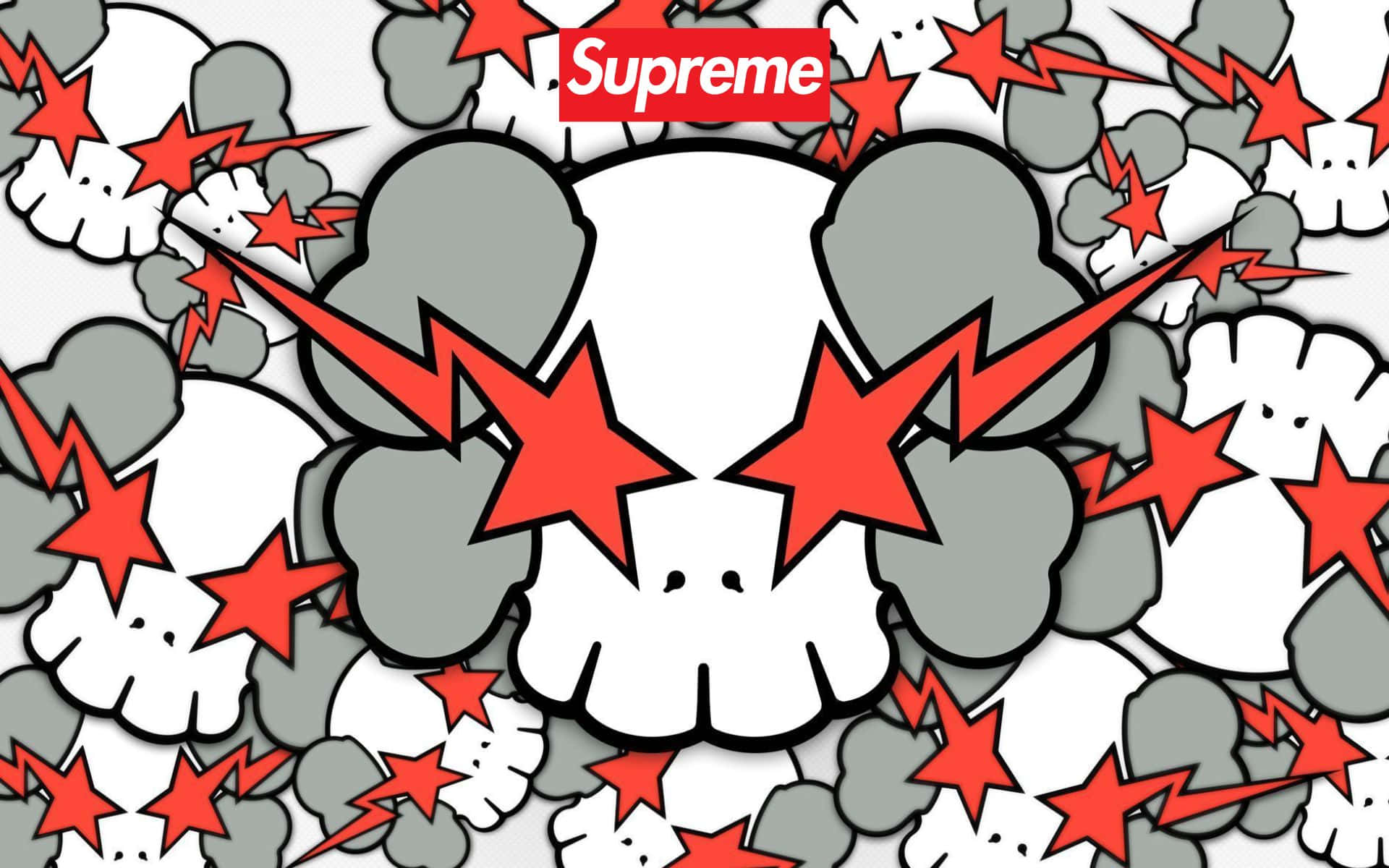 Kaws X Supreme 桌布 壁紙 — 一款大膽的圖案壁紙，中央有一個骷髏頭，周圍環繞著紅色星星和灰色煙霧雲，並帶有Supreme標誌。