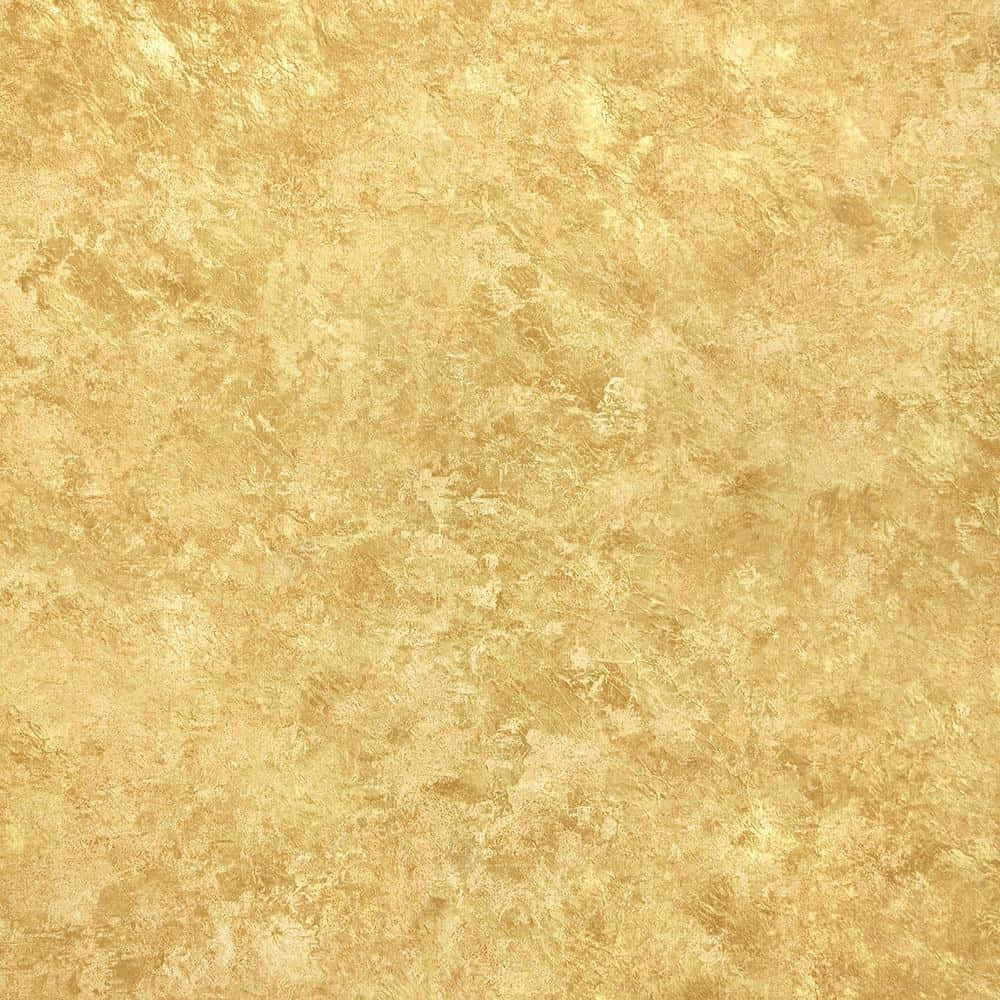 金色動態 桌布 壁紙 — 一款奢華的金色紋理壁紙，帶有斑駁圖案和暖色調的細微變化。