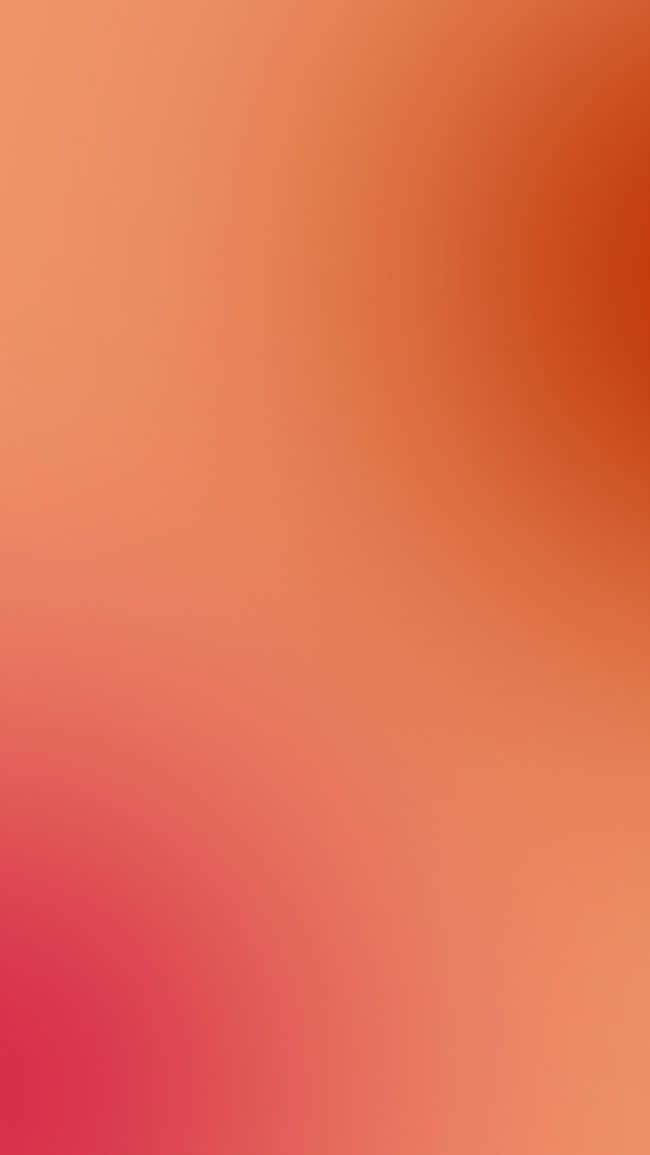 Orange Gradient 桌布 壁紙 — 一款平滑漸層的桌布，融合了溫暖的珊瑚蜜桃色和柔和的粉紅色調，帶來舒緩的視覺體驗。