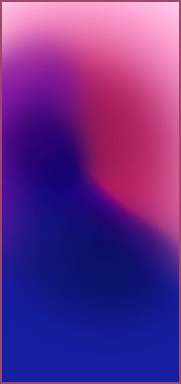  壁紙 — 一款平滑的漸變壁紙，將深藍紫色和充滿活力的粉紅色調以柔和流動的方式混合。