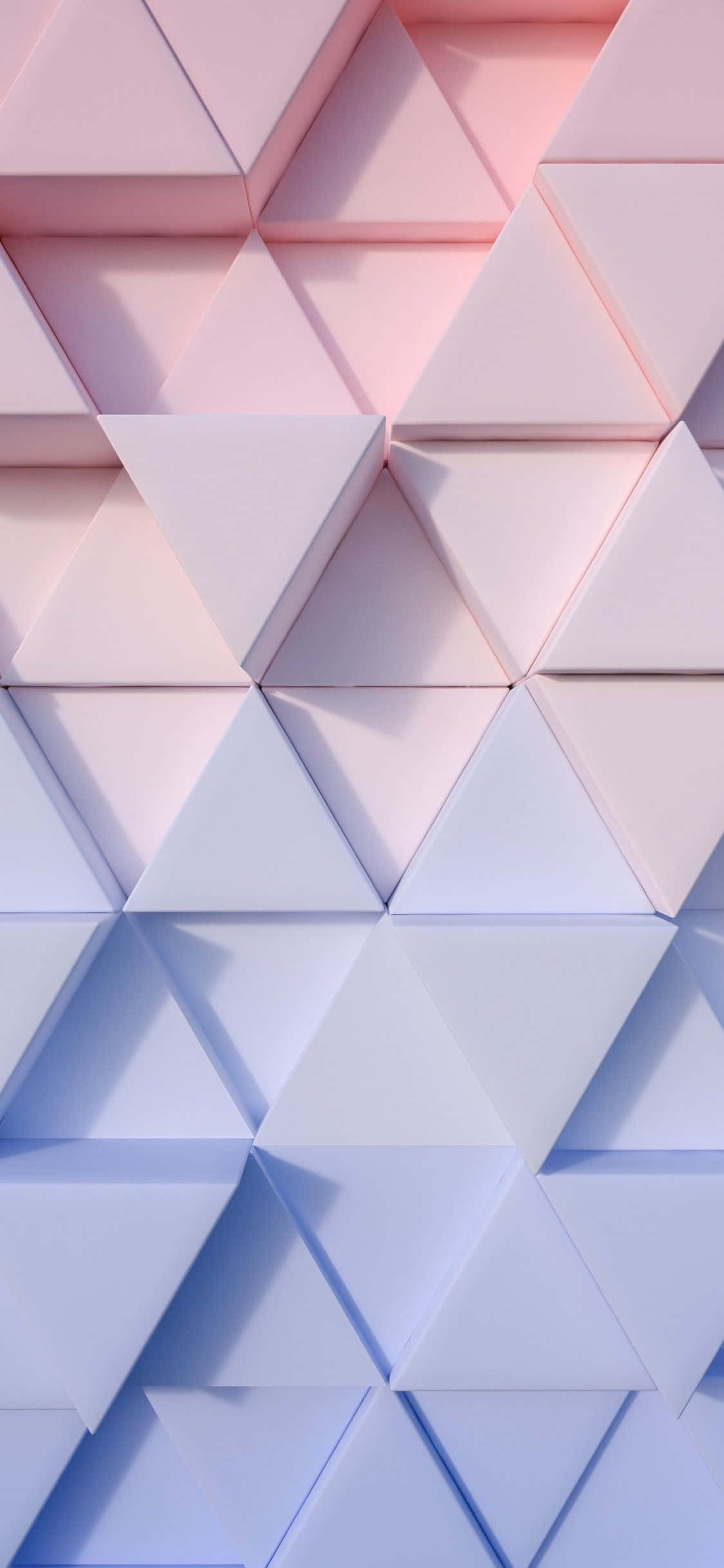3d Girly 桌布 壁紙 — 一款幾何圖案壁紙，由柔和的粉紅色和藍色三角形面板組成，以漸變圖案排列，帶有微妙的陰影。
