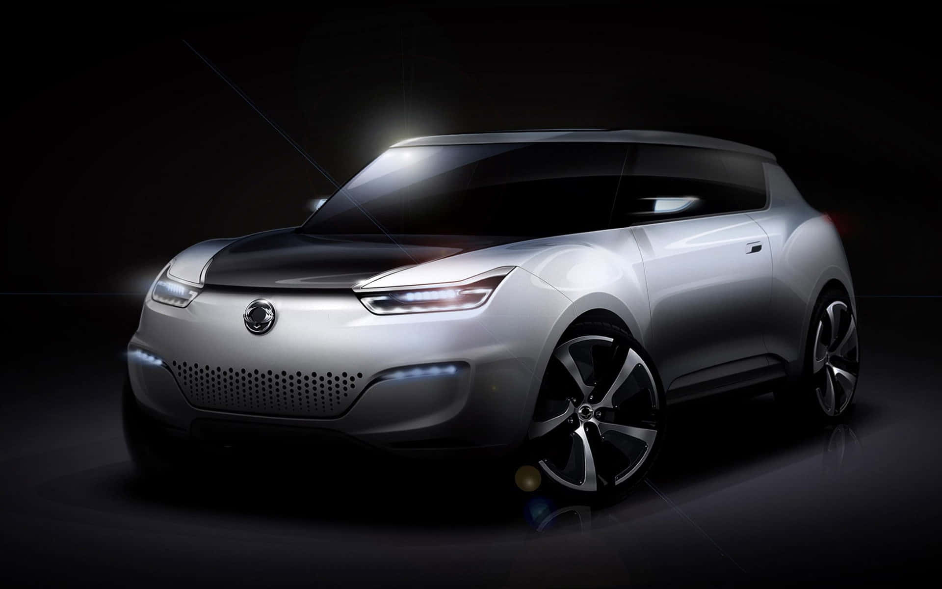 Ssangyong 桌布 壁紙 — 一款時尚的銀色未來感SUV概念車在戲劇性的工作室燈光下，在深色背景中閃耀。
