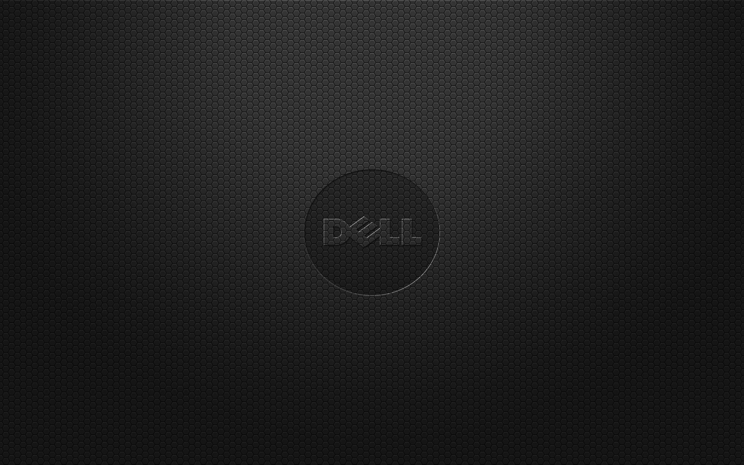 Dell Laptop 桌布 壁紙 — 一款時尚的黑色六角形紋理壁紙，中央帶有微妙的Dell標誌，置於柔和的漸變燈光中。