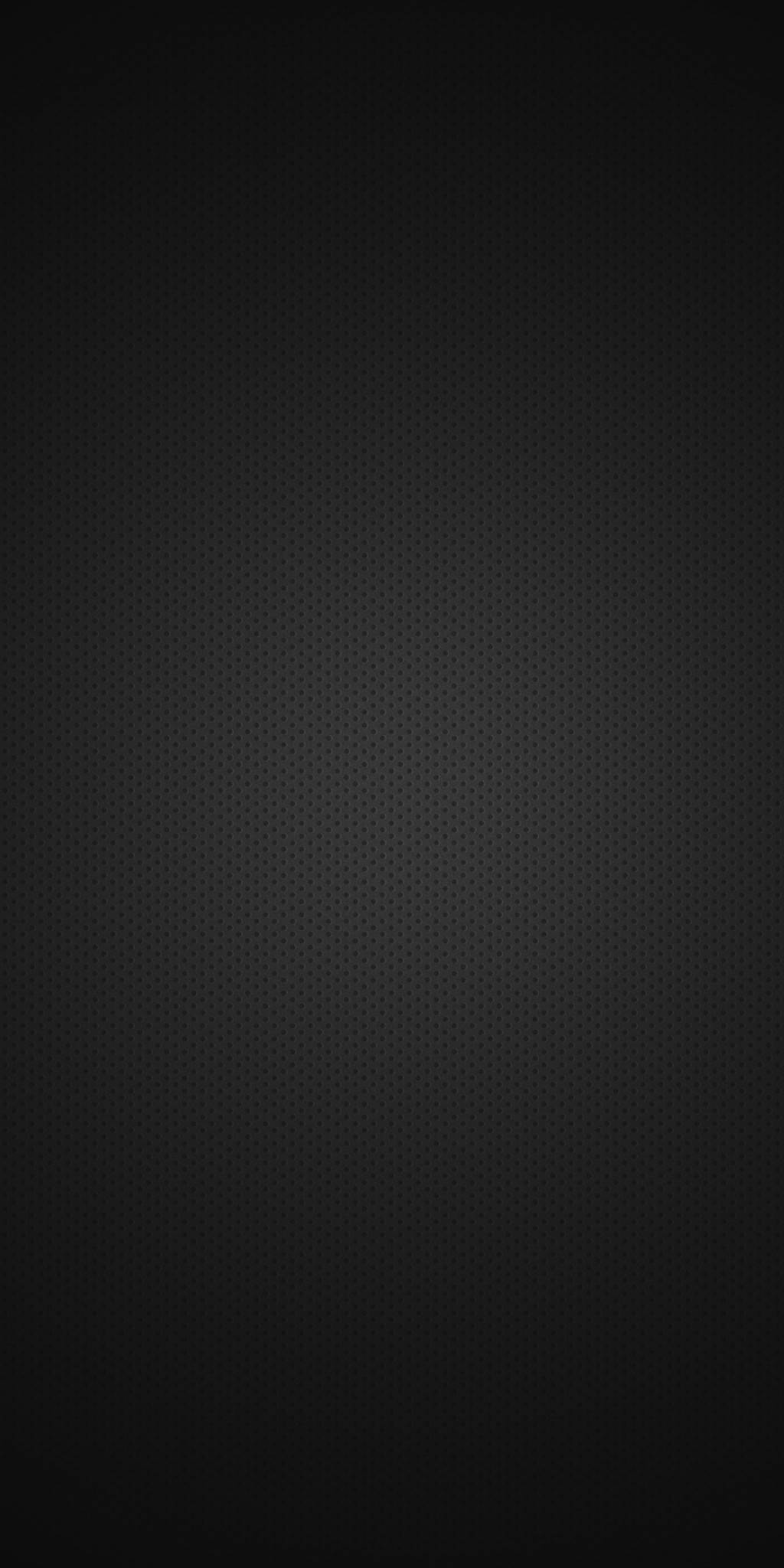 Black Page 桌布 壁紙 — 一款極簡深灰色壁紙，帶有微妙的重複圓點圖案和柔和漸層效果。